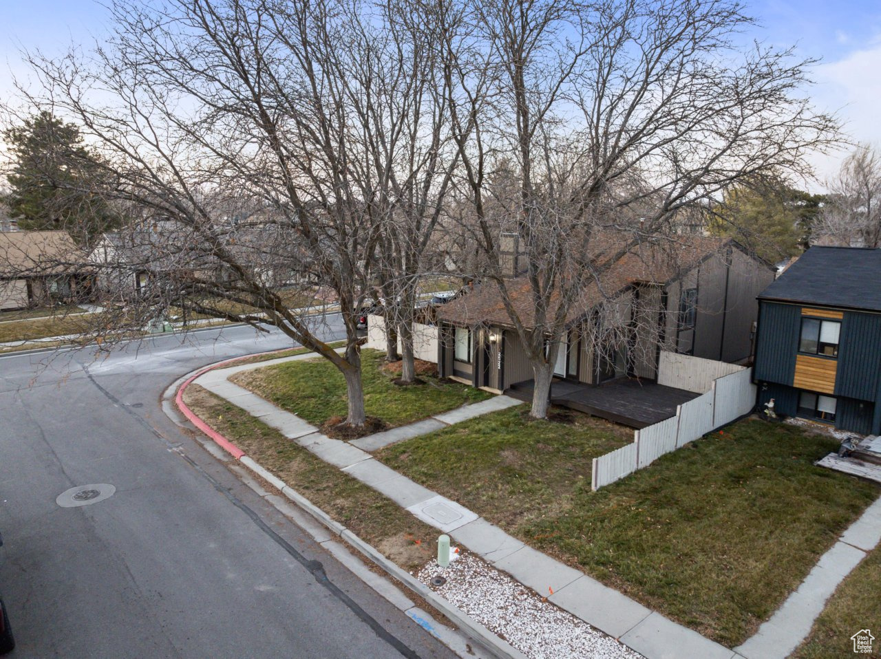 View of front of property with a lawn