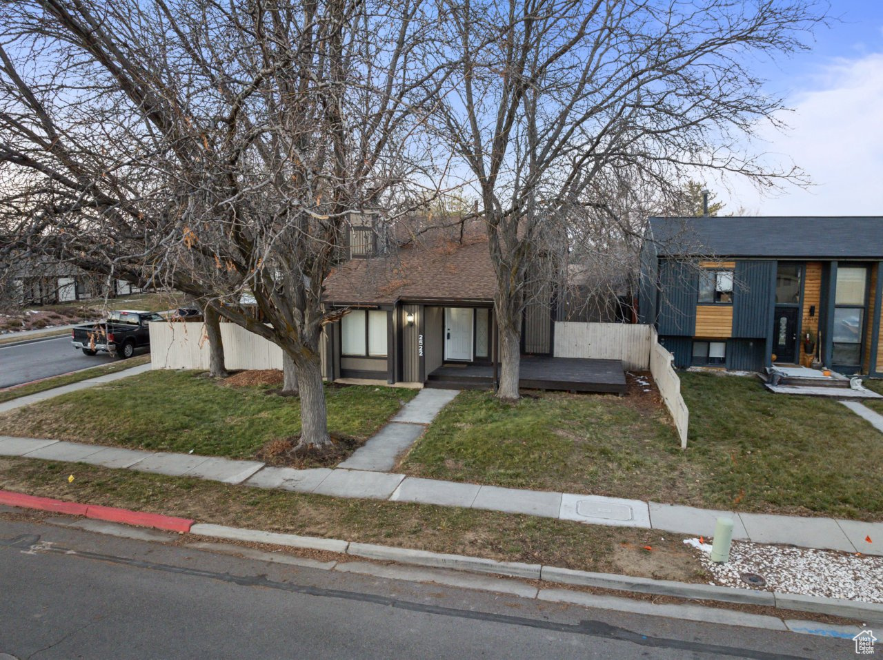 View of front of house featuring a front lawn