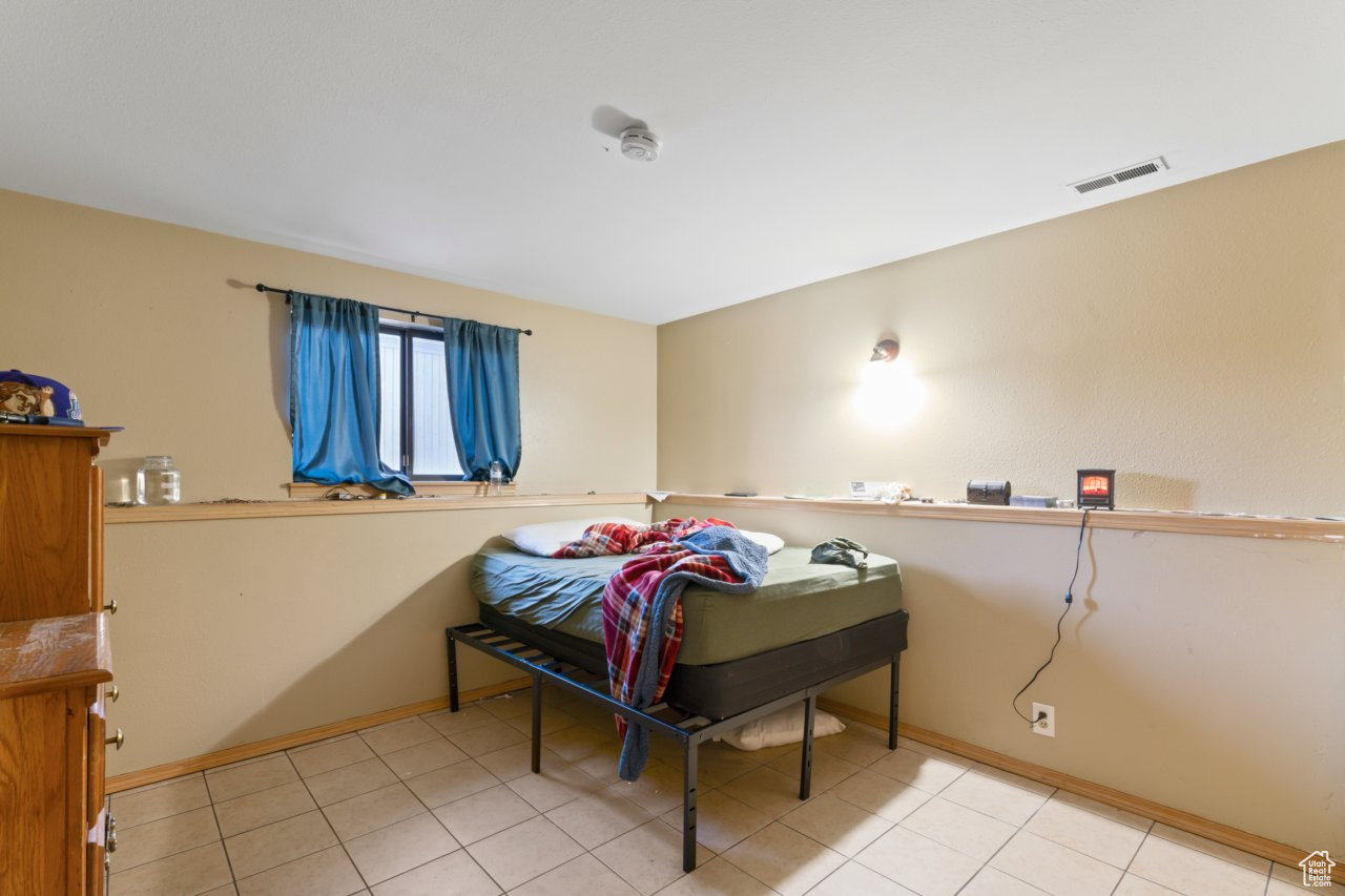 View of tiled bedroom