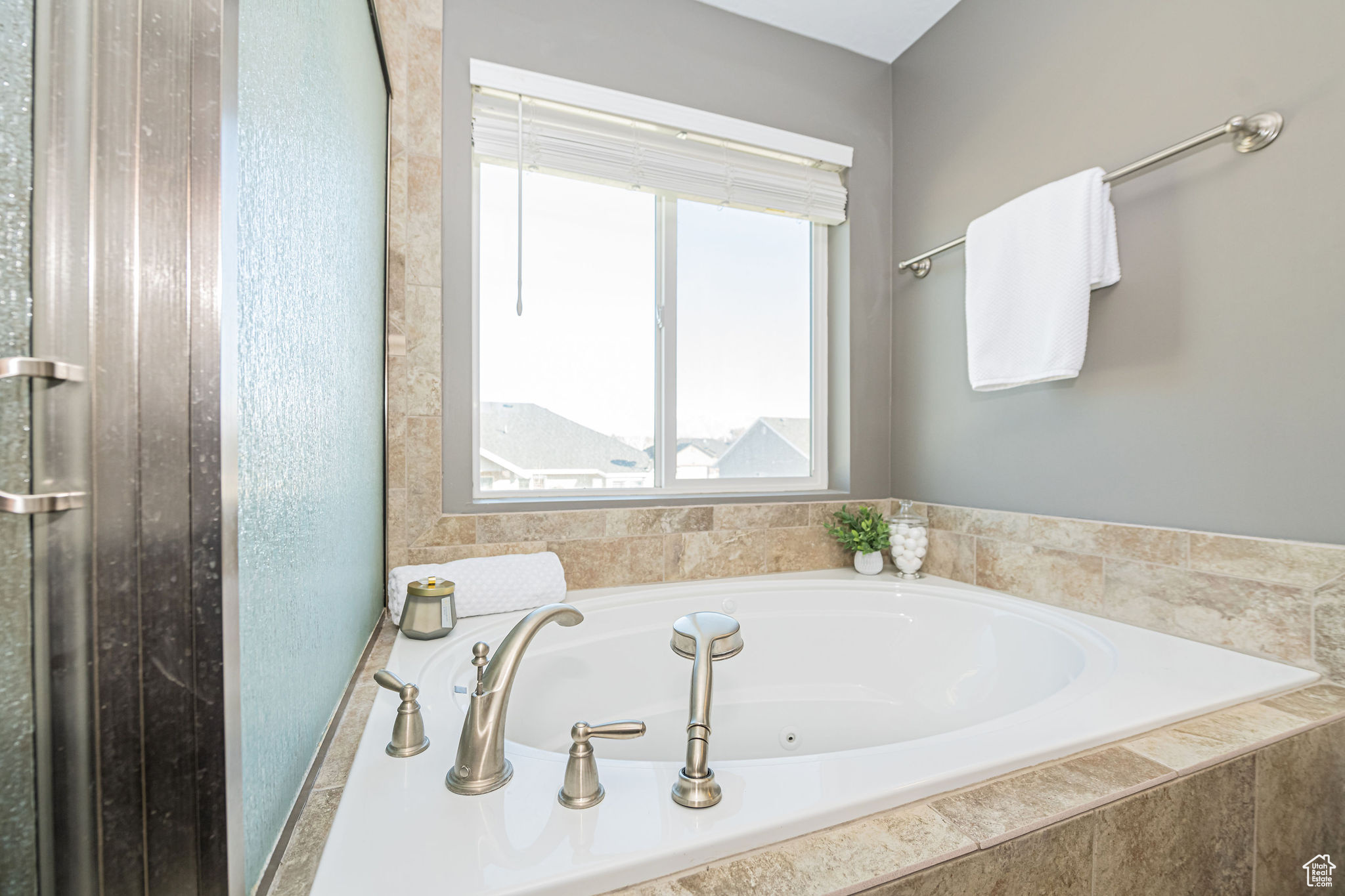 Bathroom featuring a relaxing tiled tub