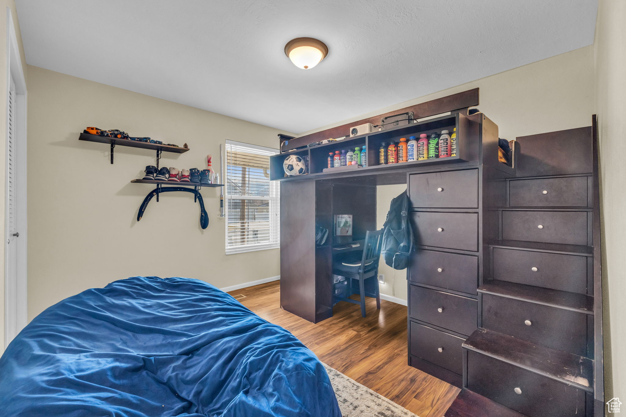 Bedroom featuring hardwood / wood-style flooring