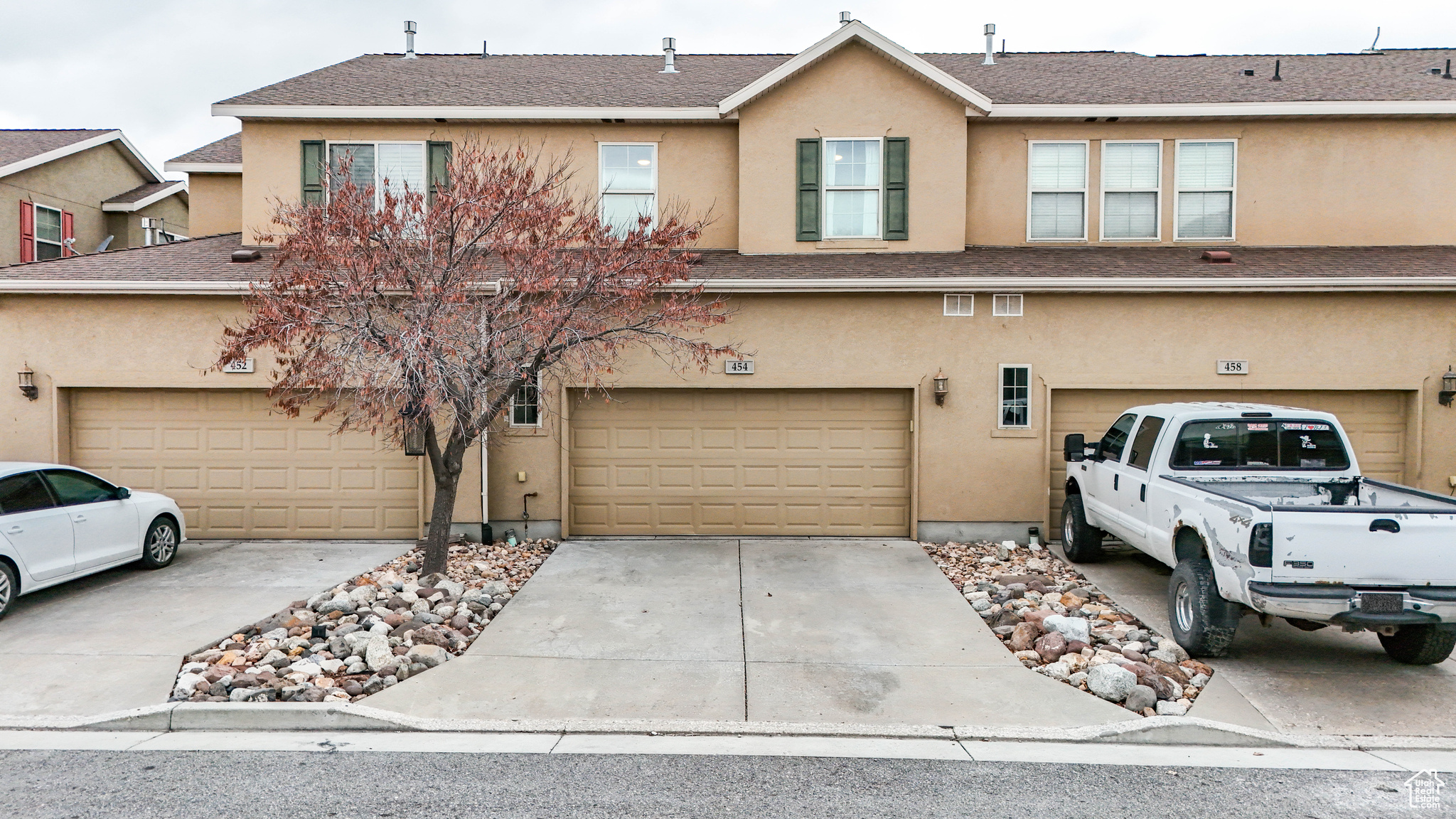 View of property featuring a garage