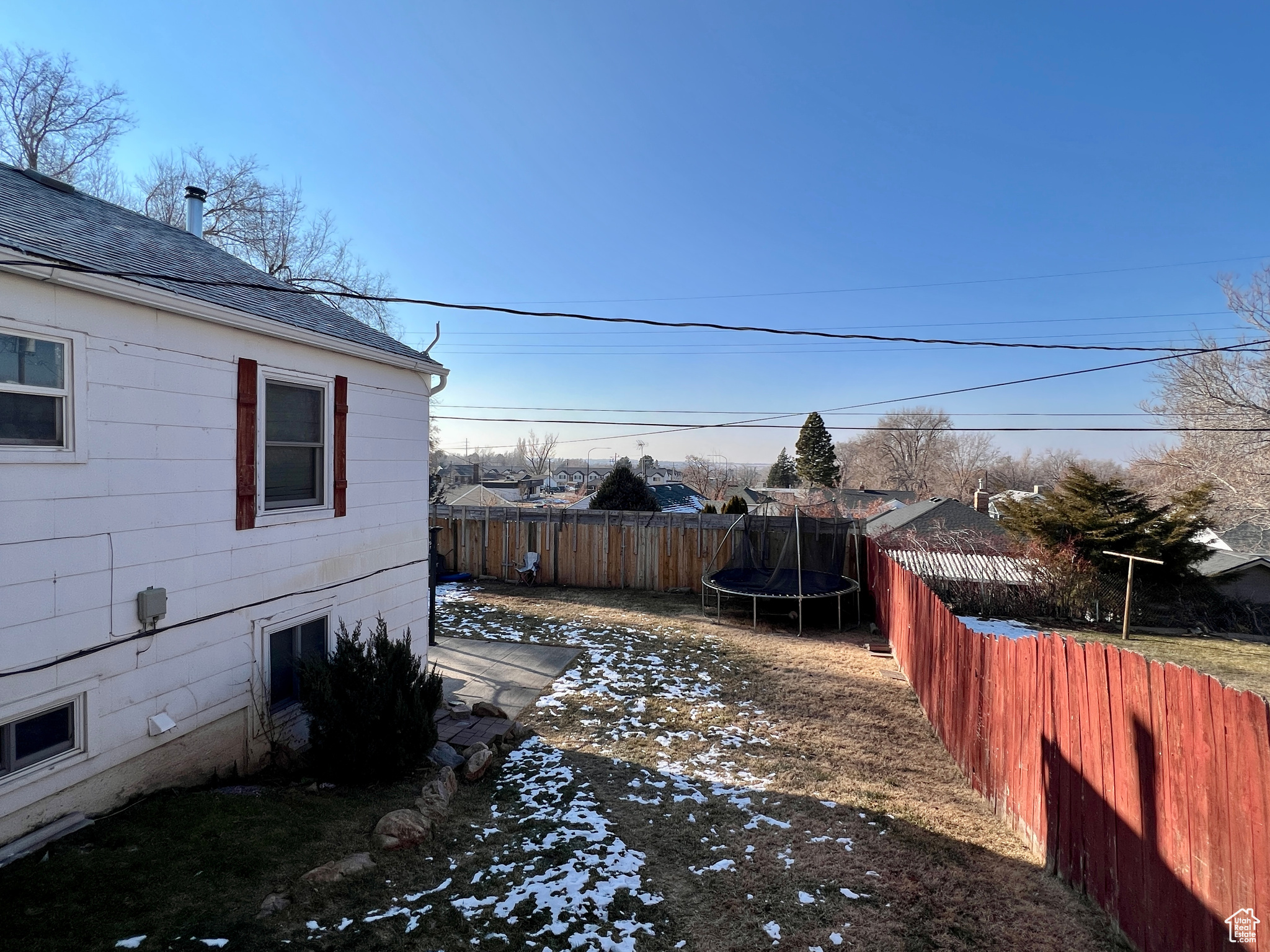 View of yard featuring a trampoline