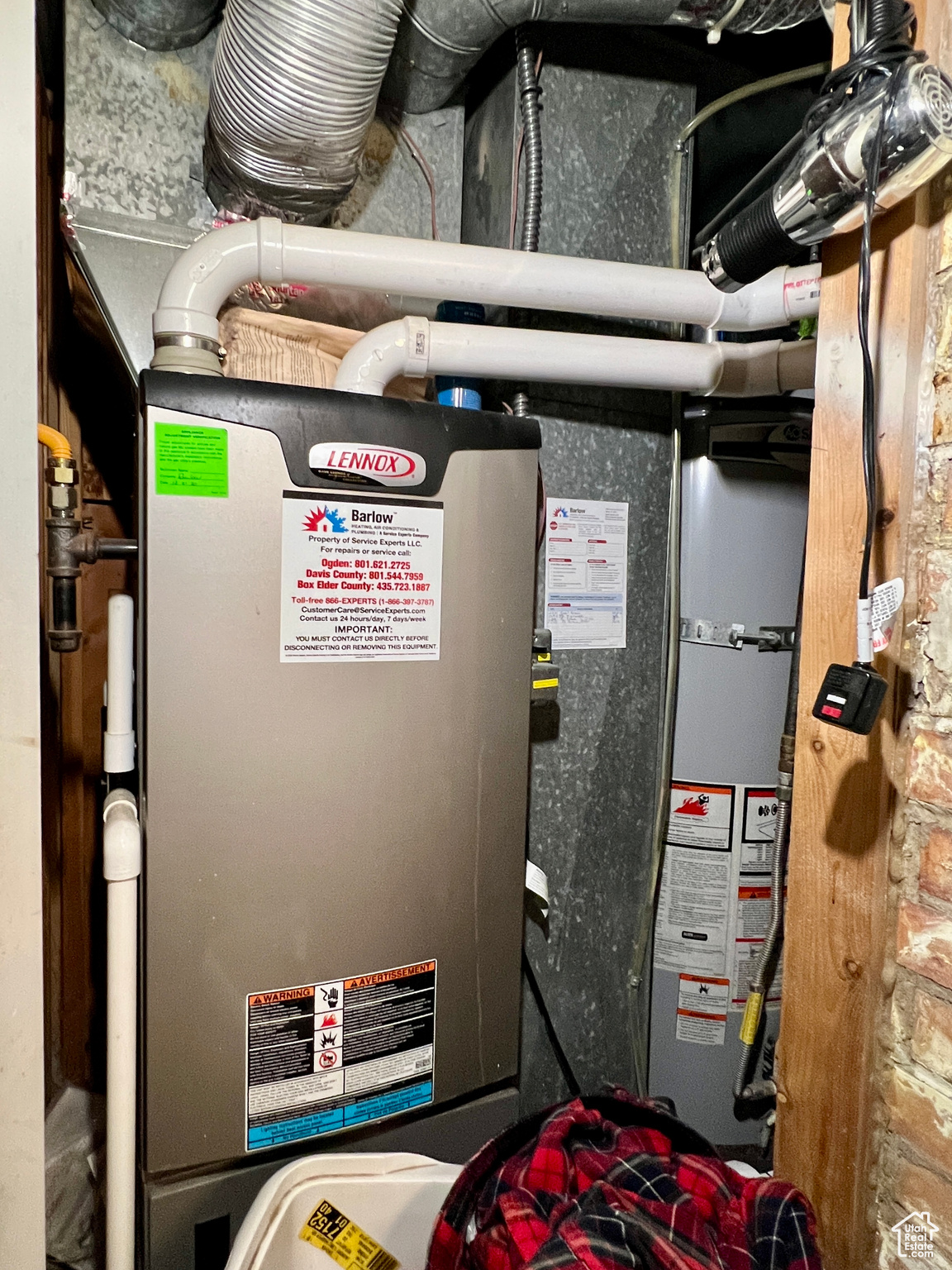 Utility room featuring water heater