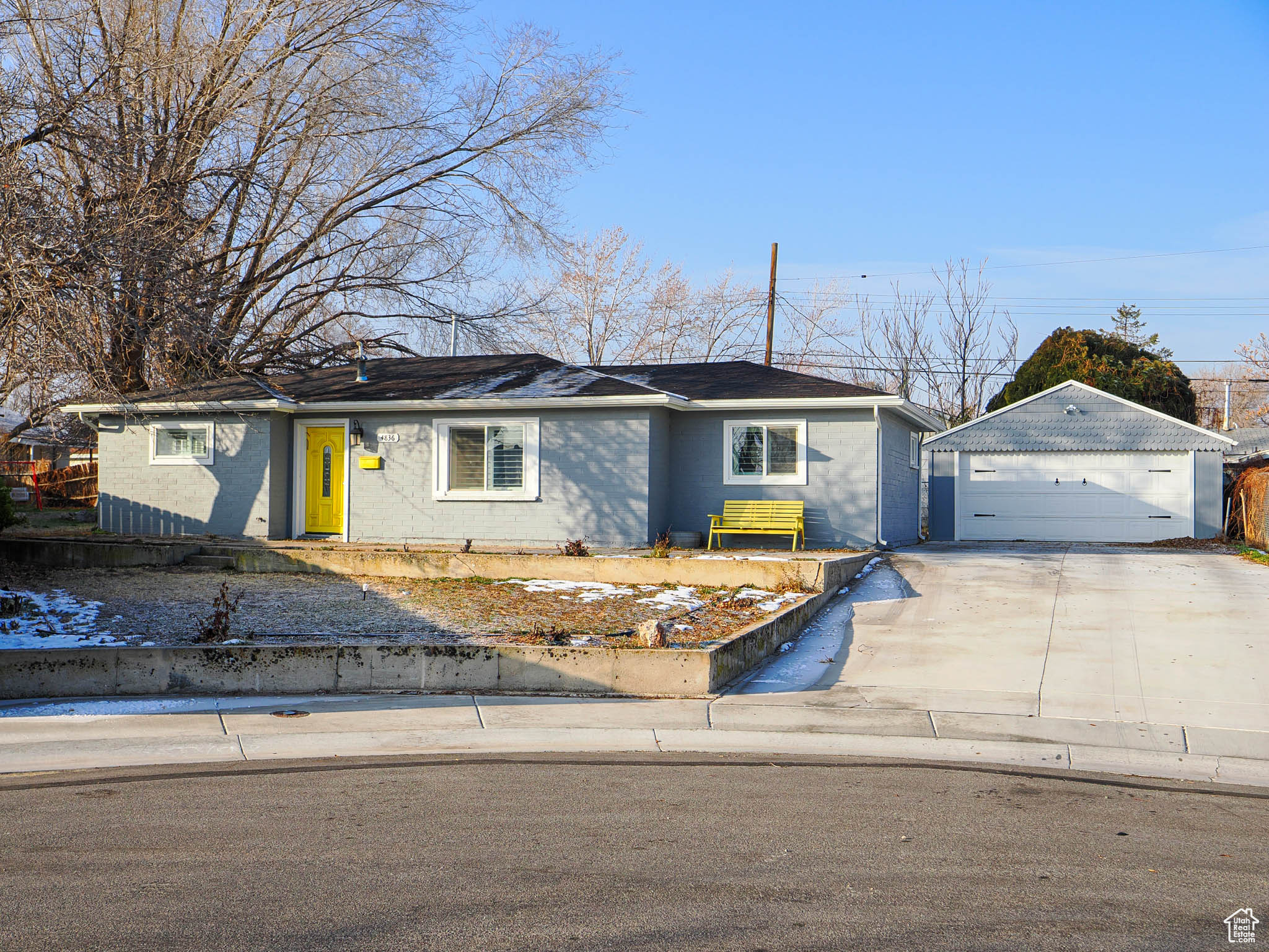 Ranch-style home with a garage