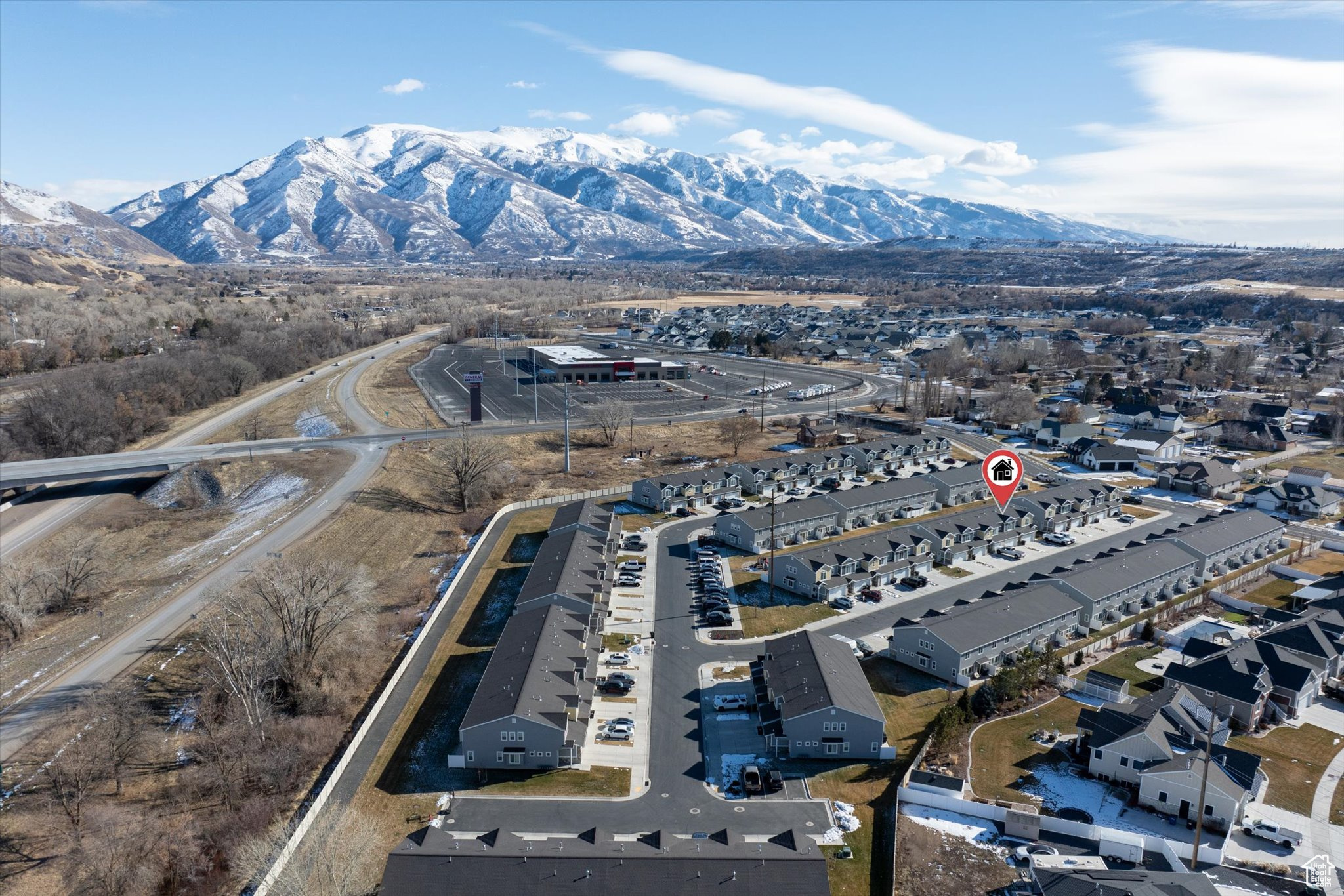 Birds eye view of property with a mountain view