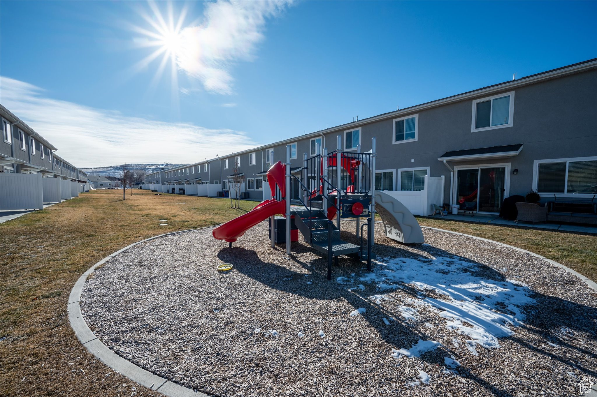 View of jungle gym with a yard