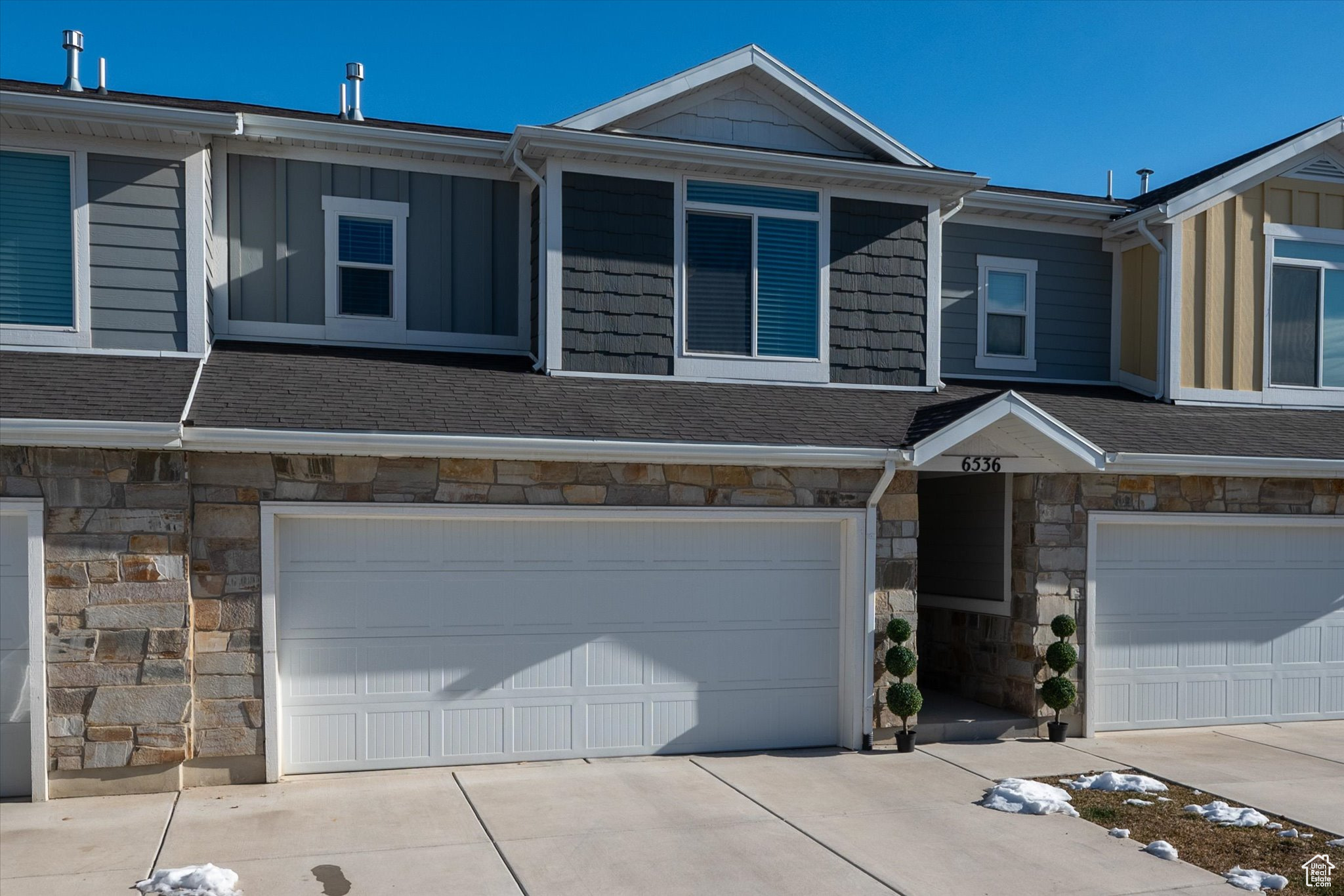 View of property featuring a garage