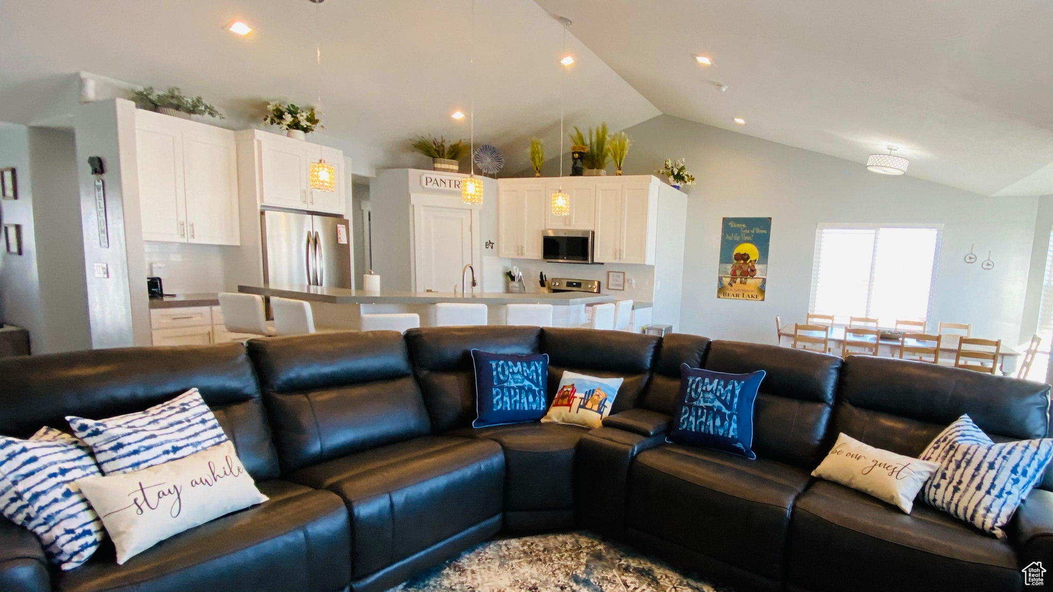 Living room with lofted ceiling