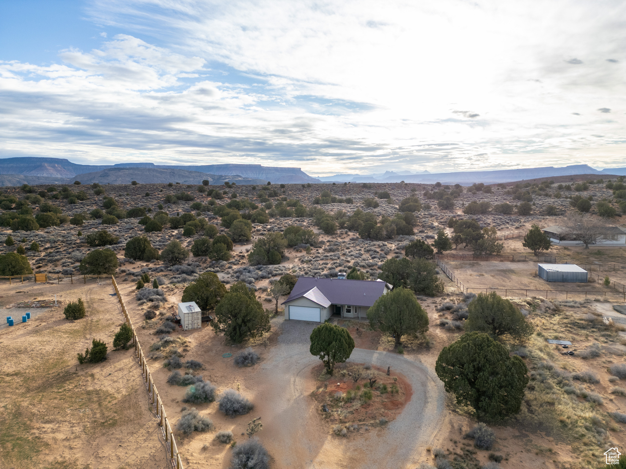 Birds eye view of property with a mountain view