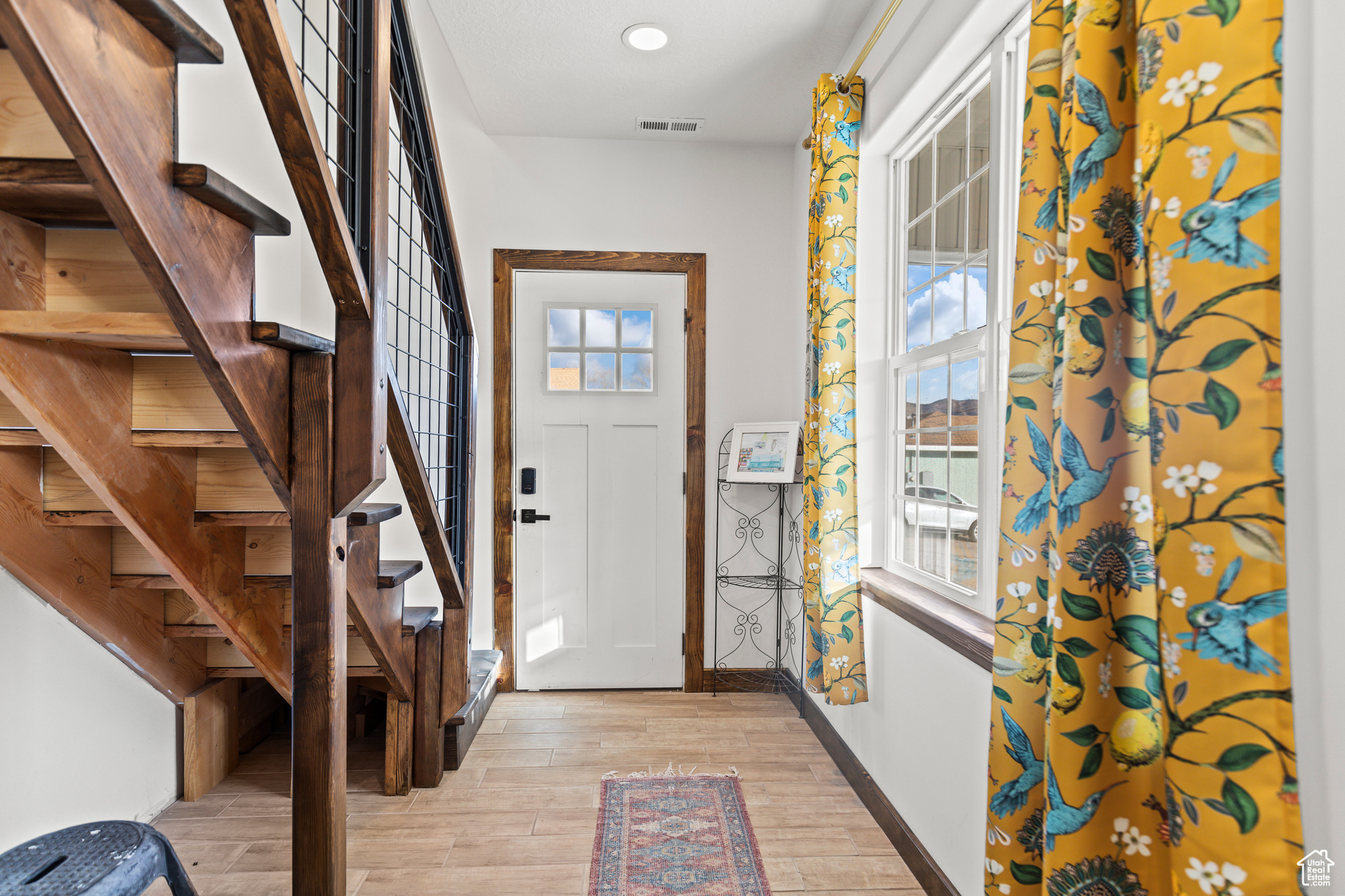 Entryway with light wood-type flooring