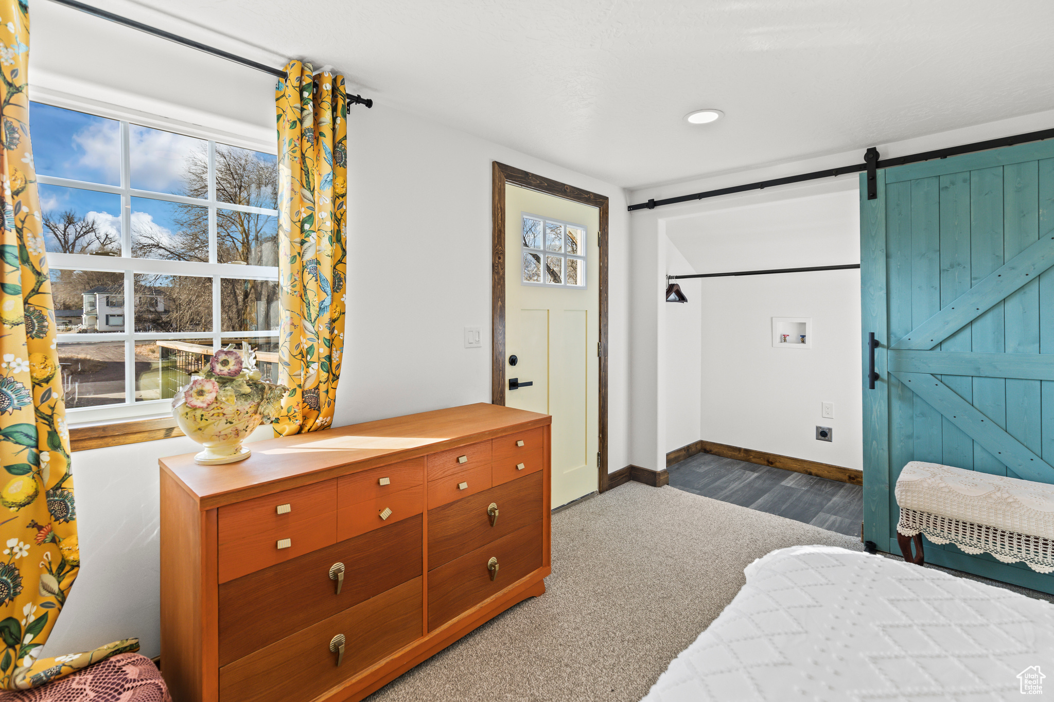 Bedroom with a barn door