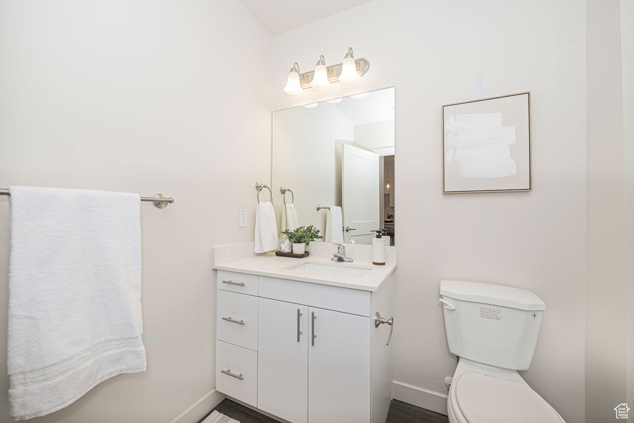 Bathroom featuring toilet and vanity