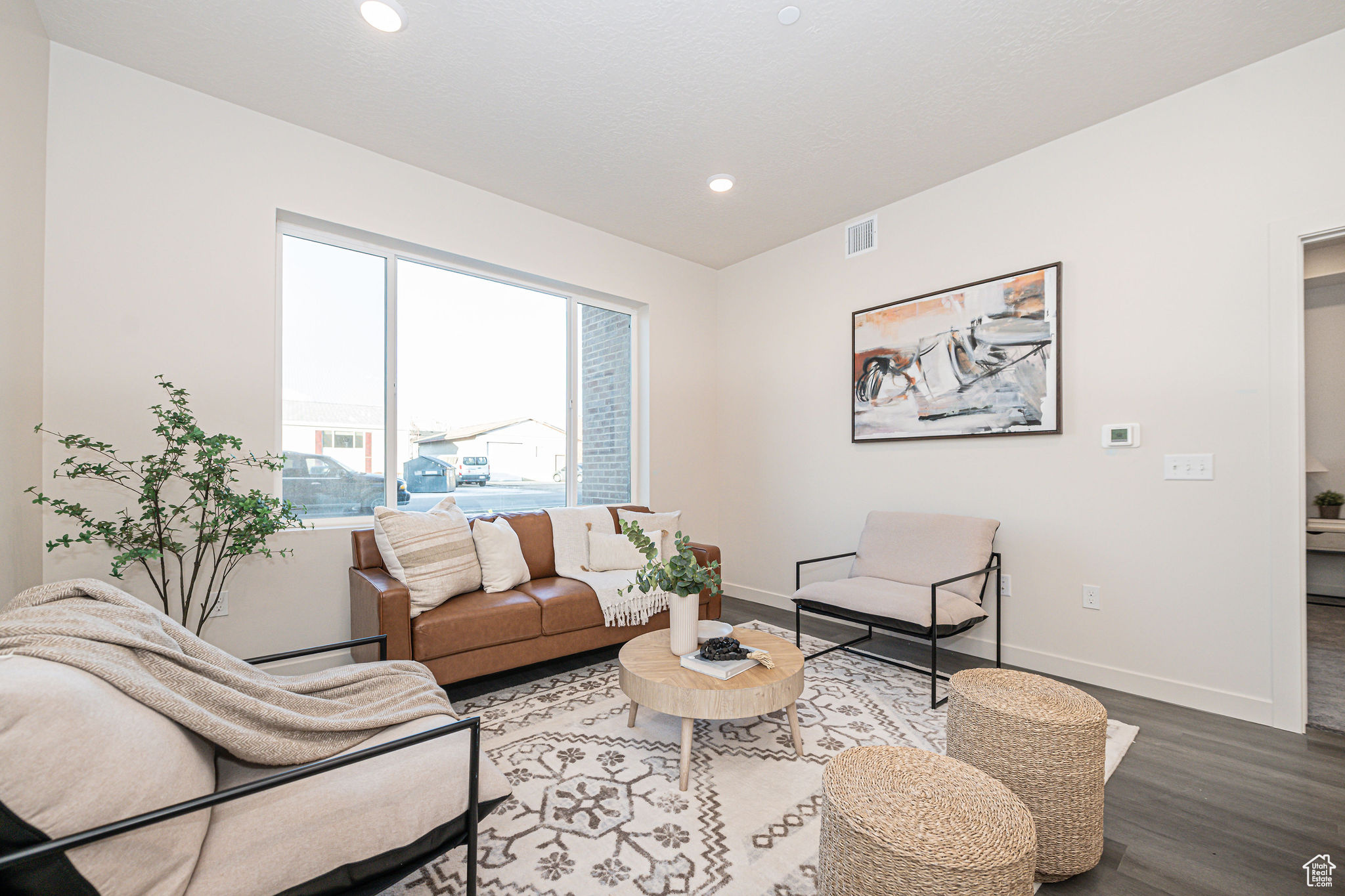 Living room featuring hardwood / wood-style floors