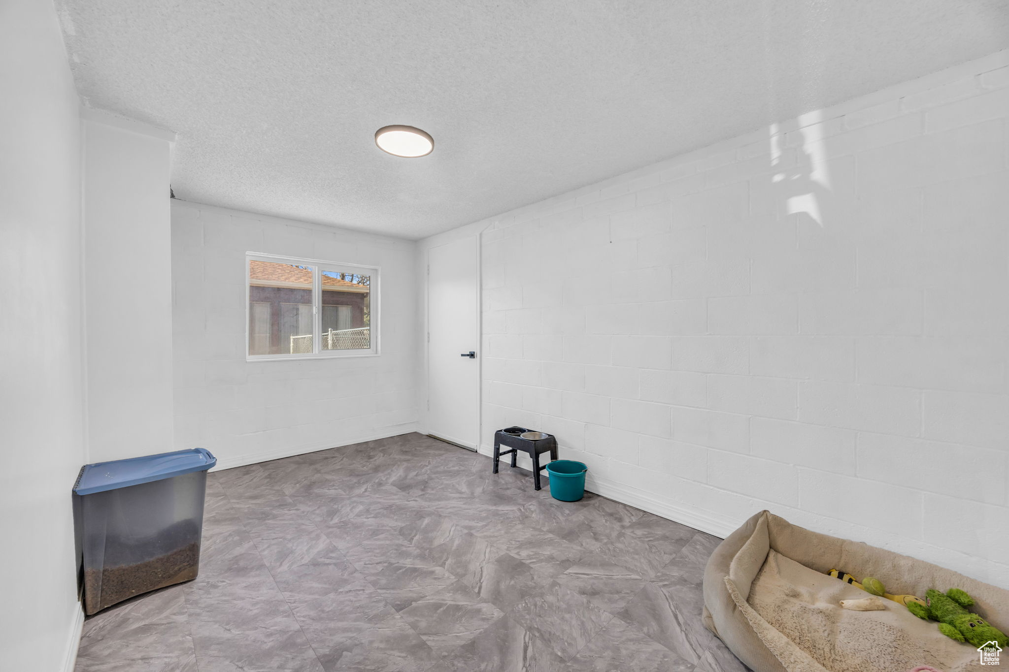 Spare room featuring a textured ceiling