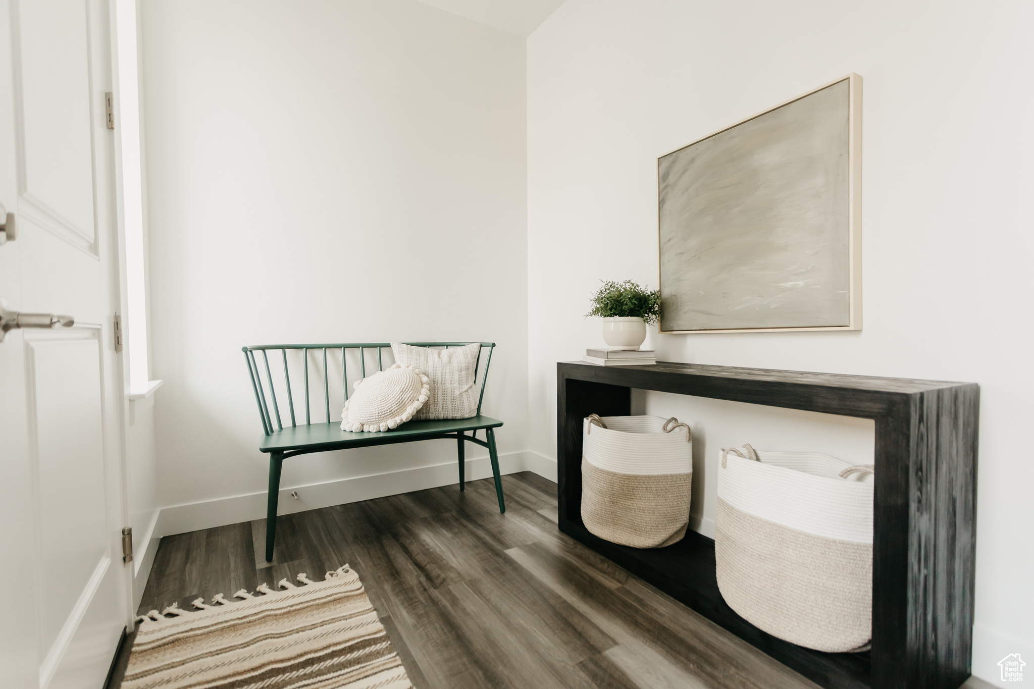 Home office featuring dark hardwood / wood-style flooring