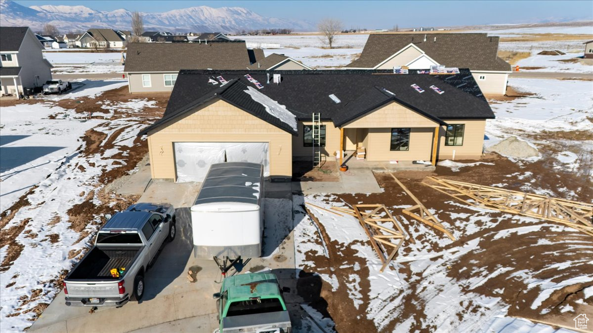 View of front of property with a mountain view