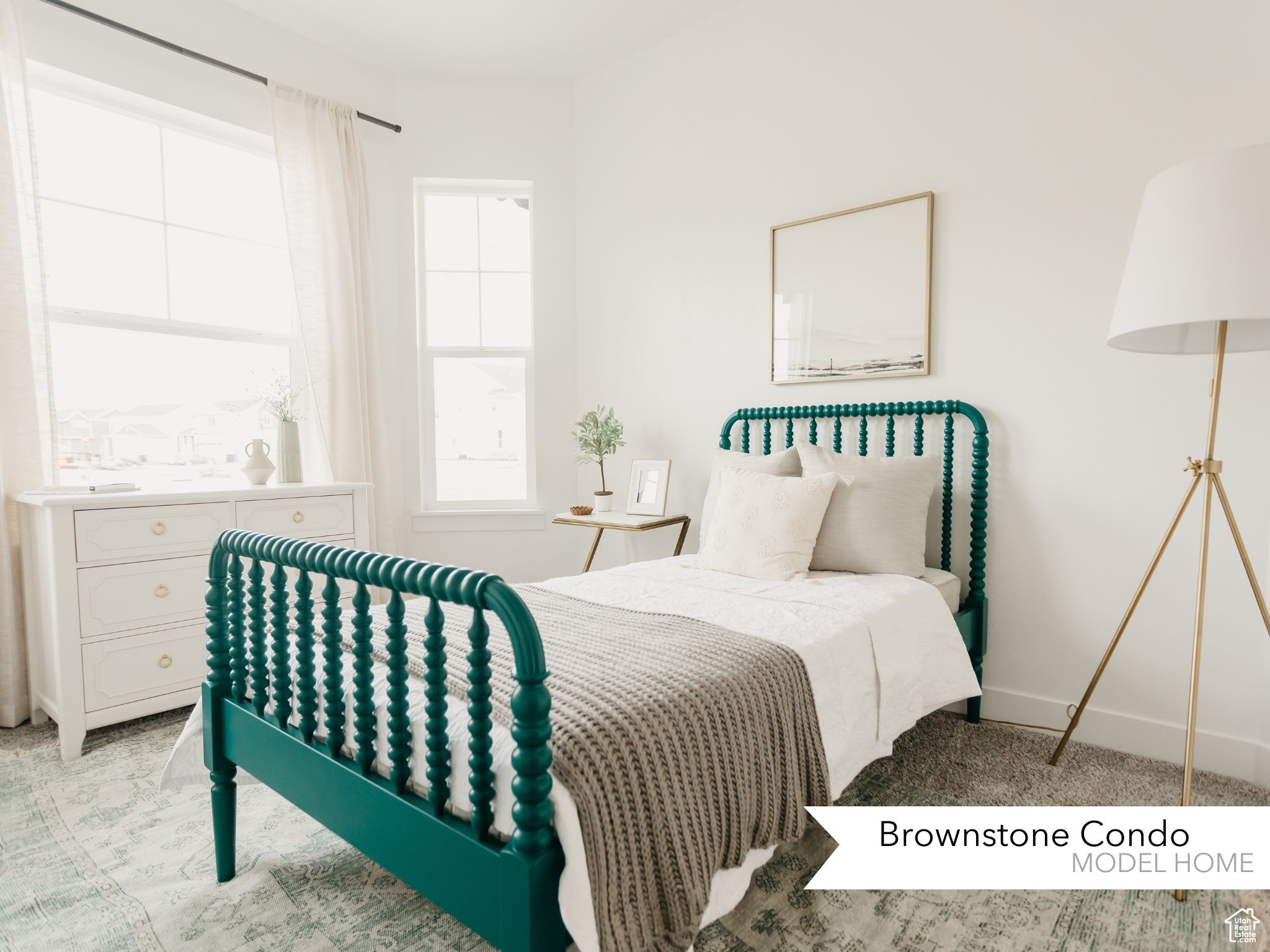 Bedroom with light colored carpet