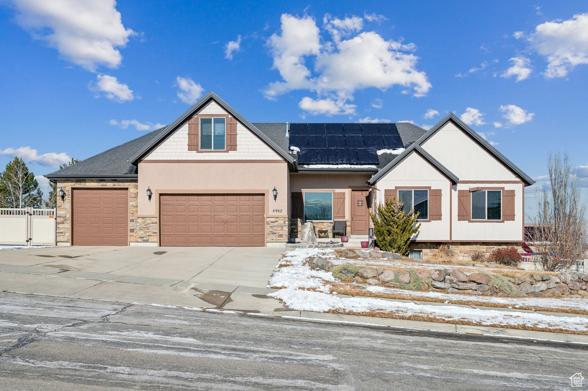 Craftsman house featuring solar panels