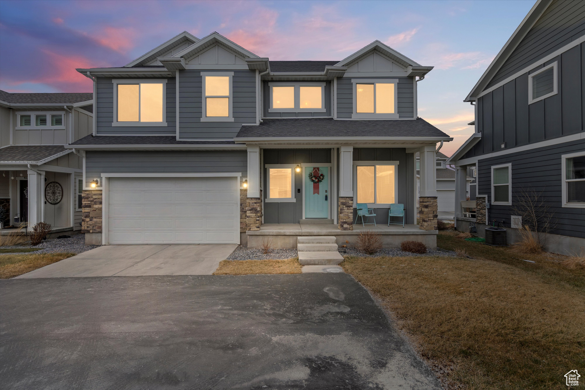 Craftsman-style home featuring covered porch