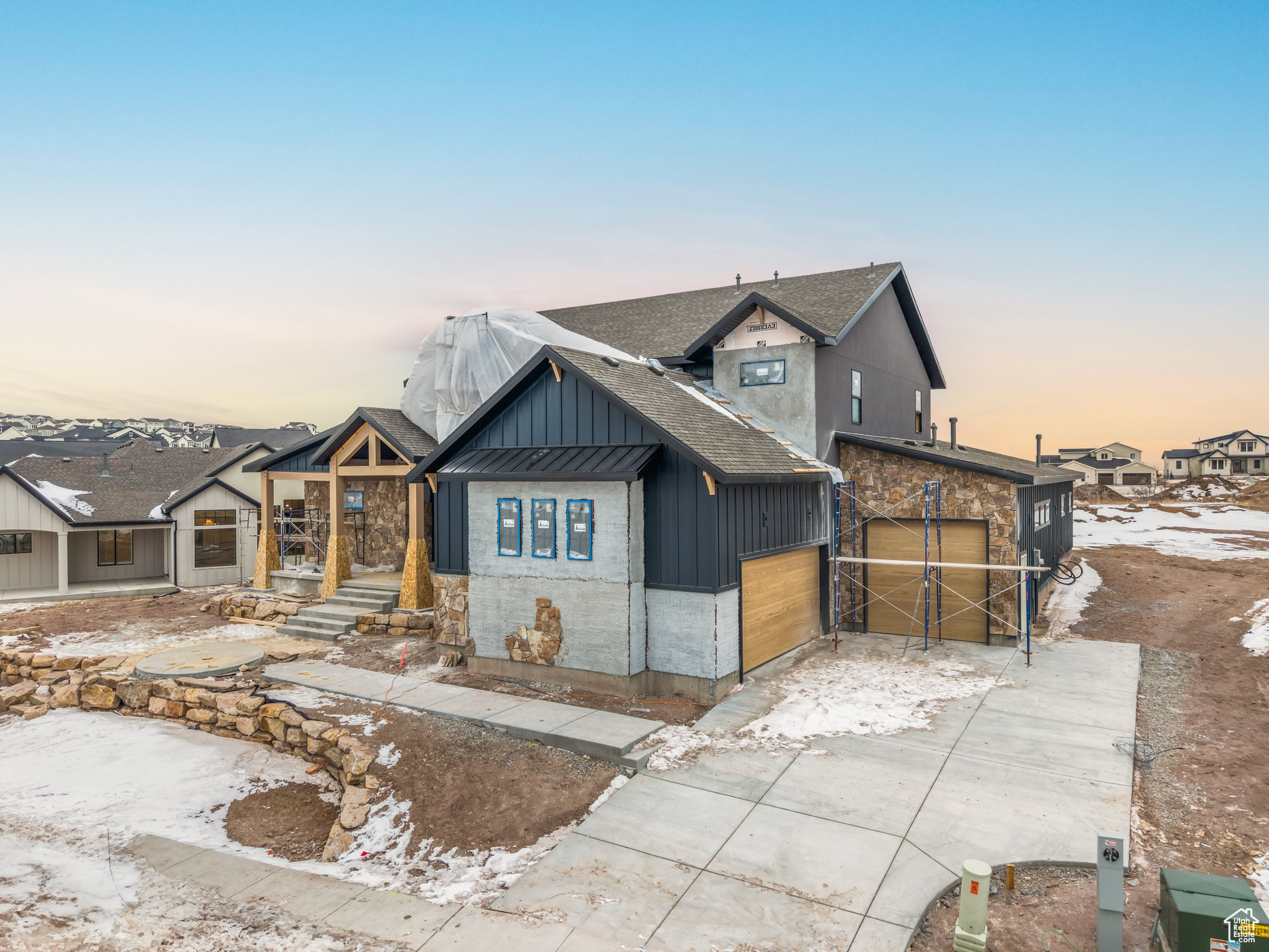 View of front of property featuring a garage