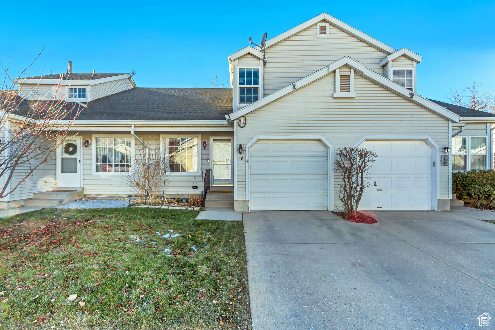 View of front of property featuring a garage