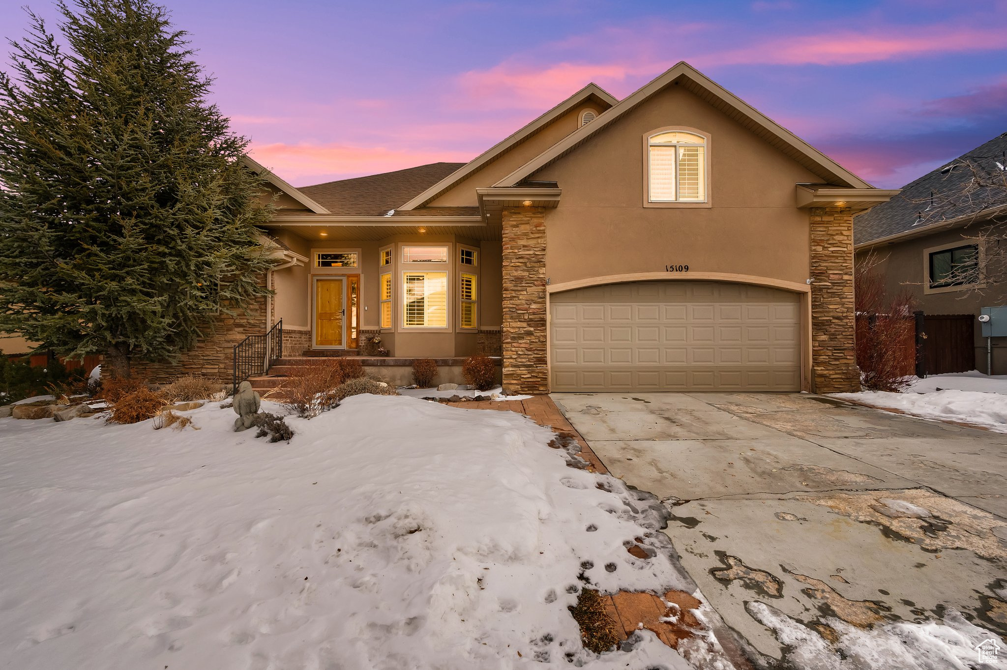 View of front of house with a garage