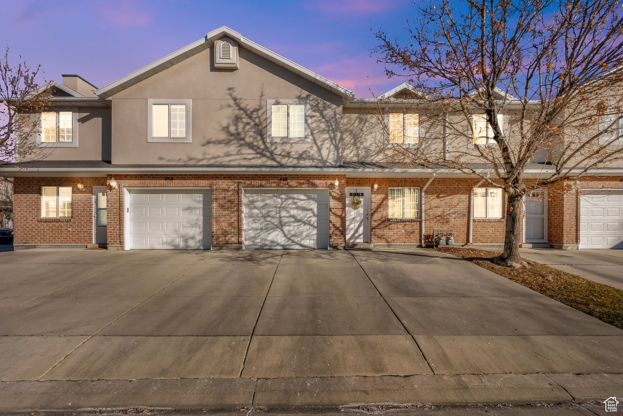 View of front of property with a garage