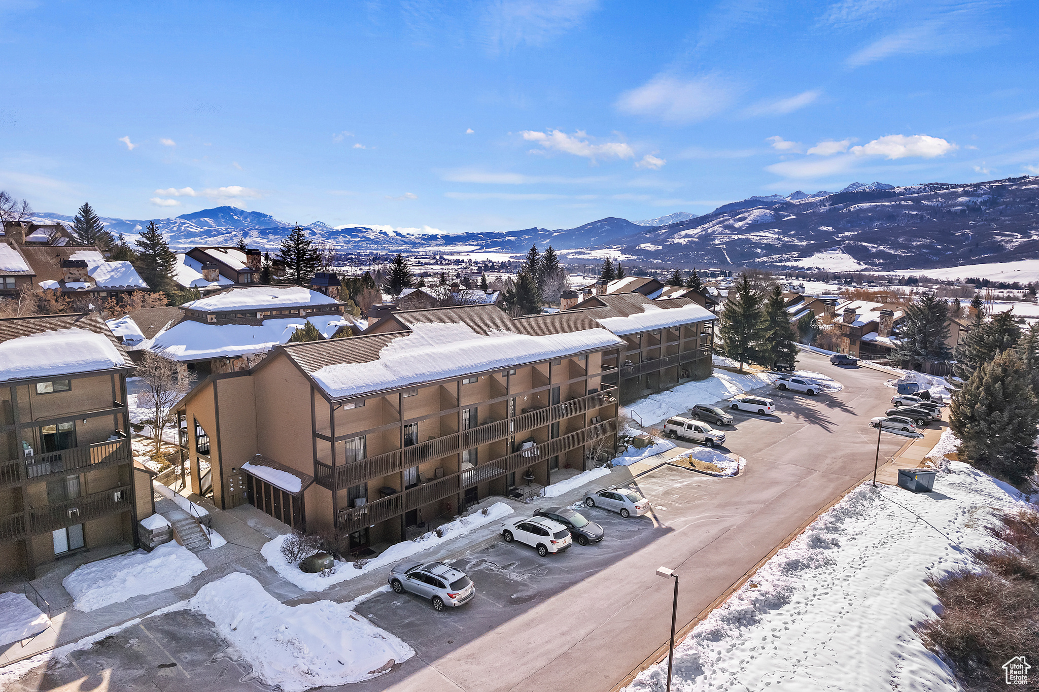 Snowy aerial view with a mountain view