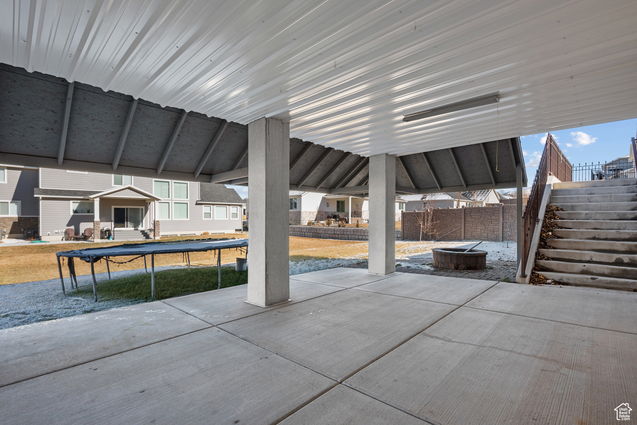 View of patio with a trampoline