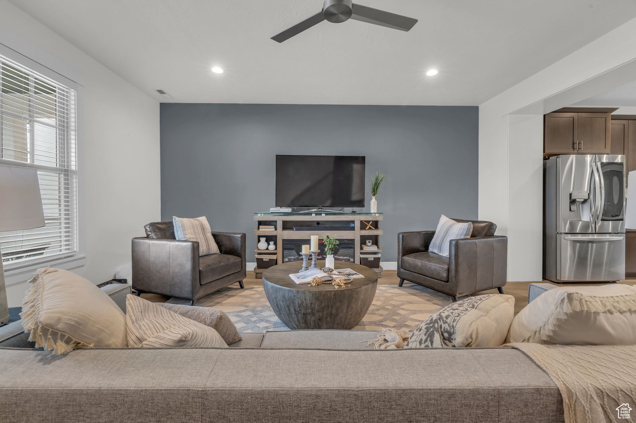 Living room featuring ceiling fan