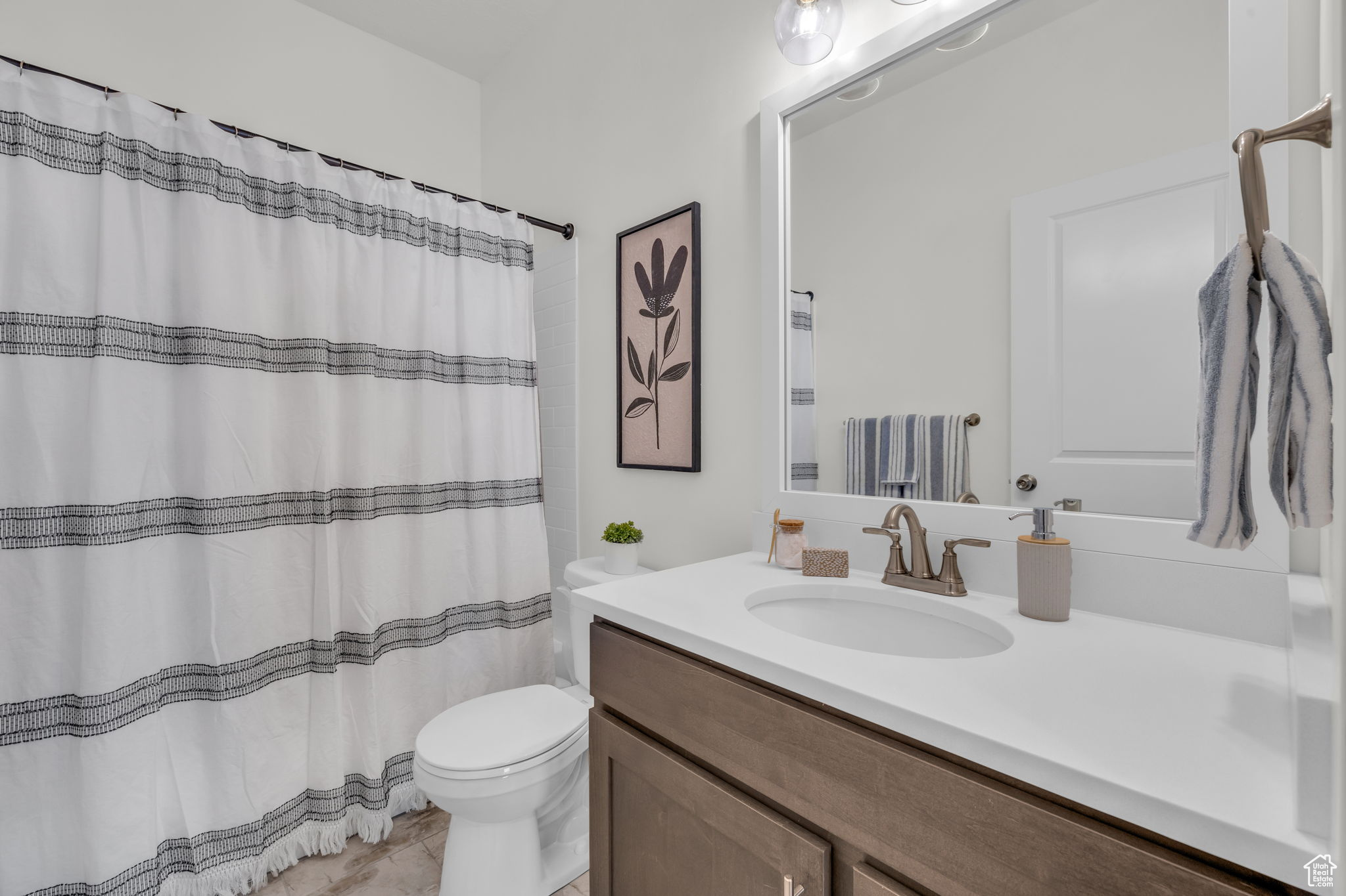 Bathroom with vanity and toilet