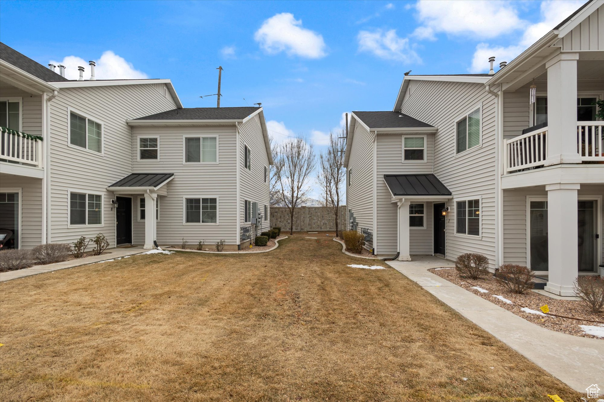 Exterior space featuring a lawn