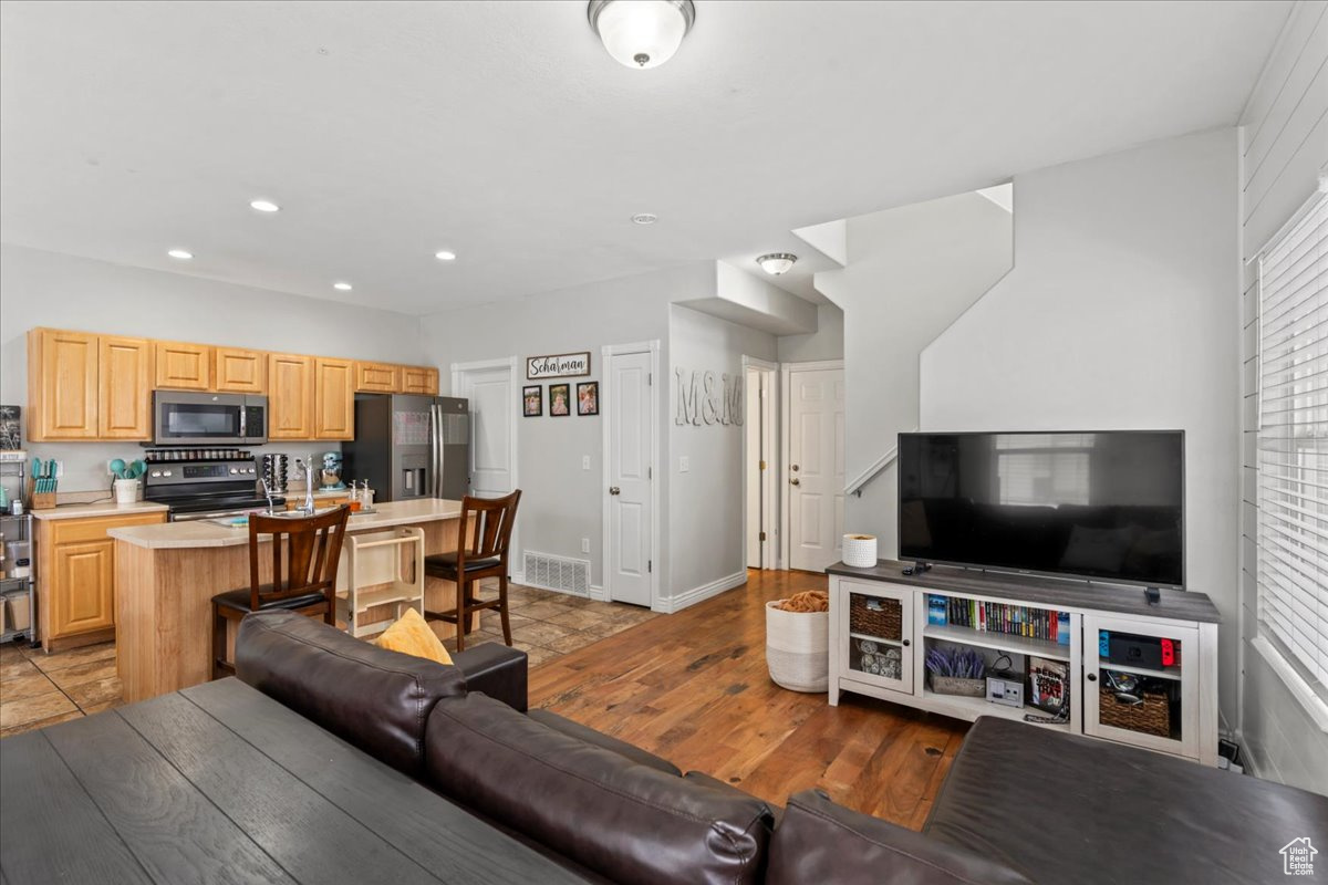 Living room featuring light hardwood / wood-style flooring