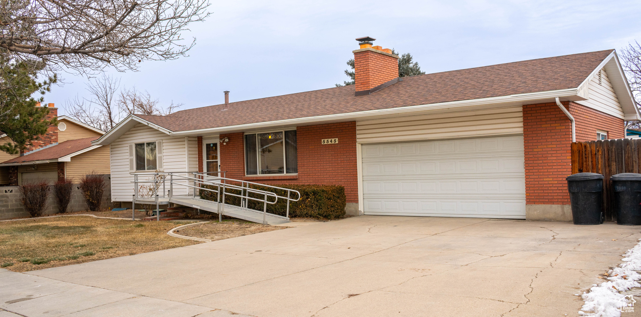 Single story home featuring a garage