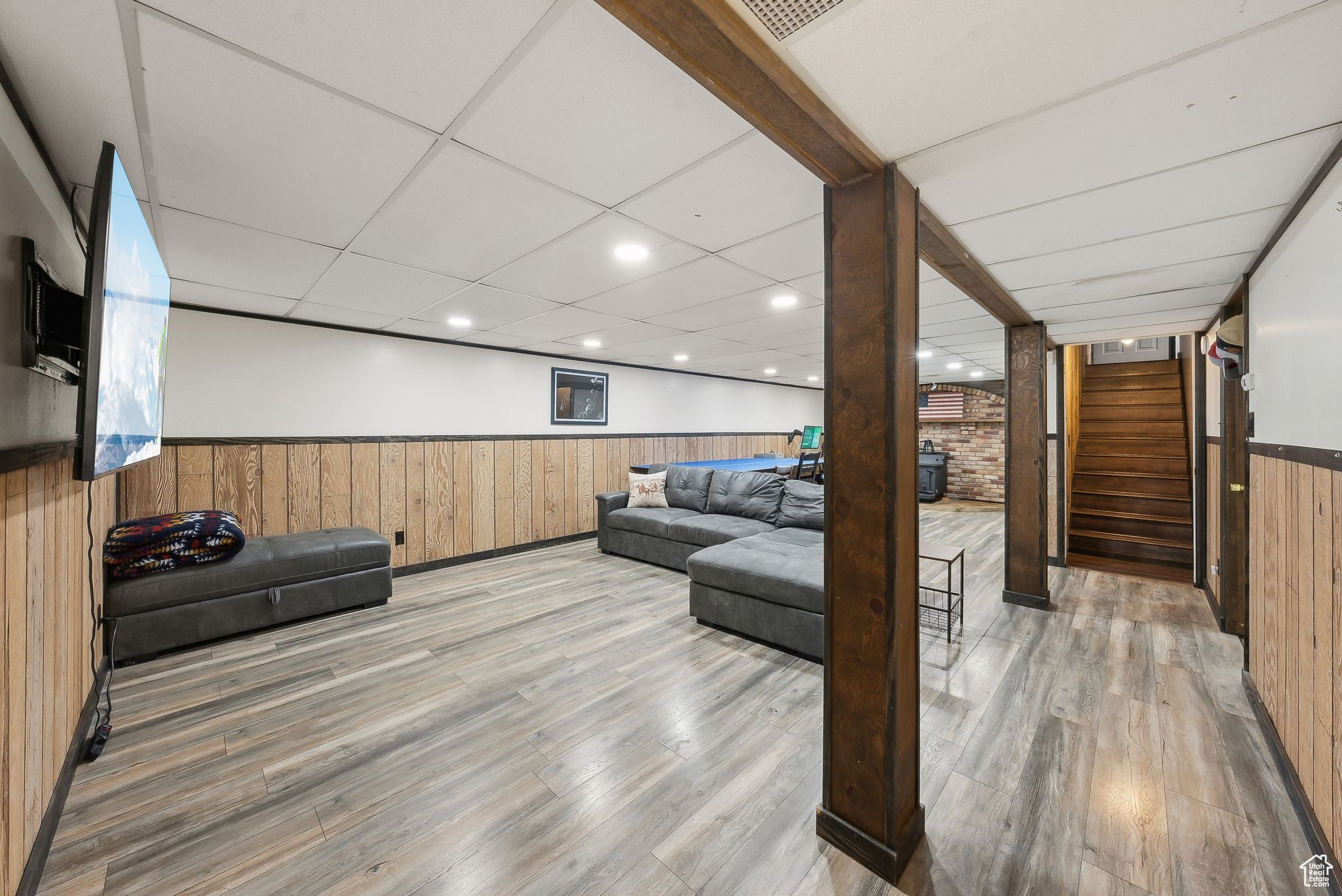 Living room with hardwood / wood-style flooring