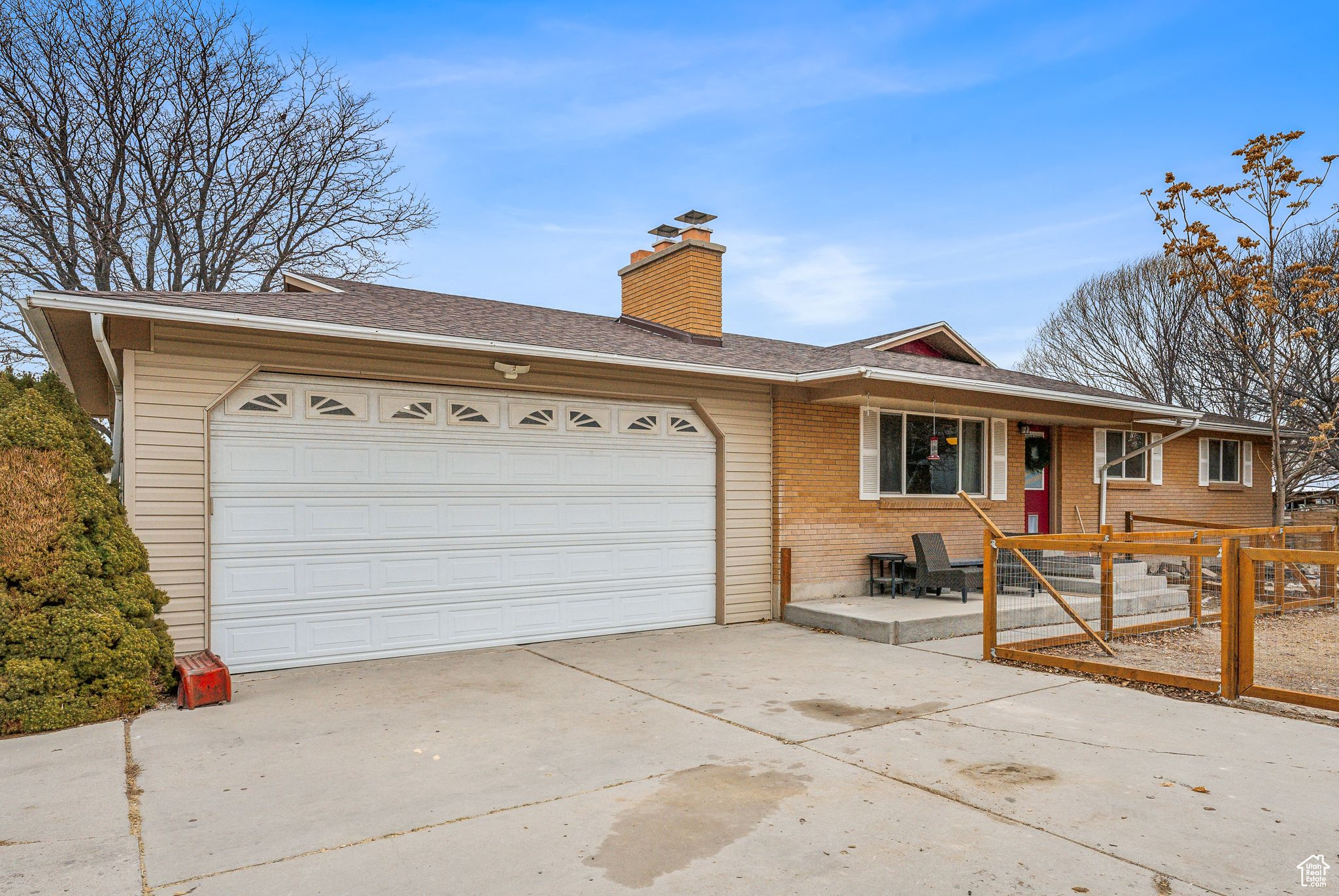 Ranch-style home with a garage