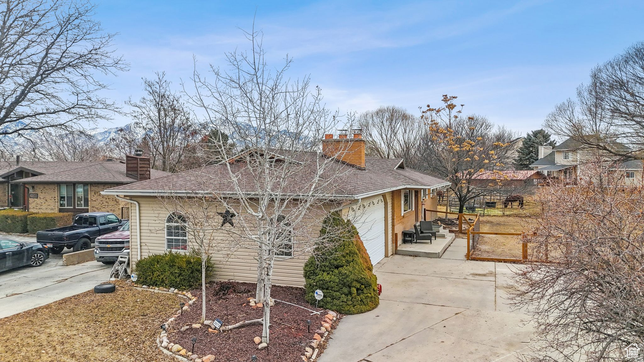 View of home's exterior with a garage