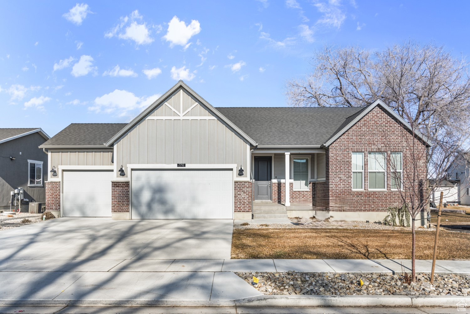 View of front of property with a garage