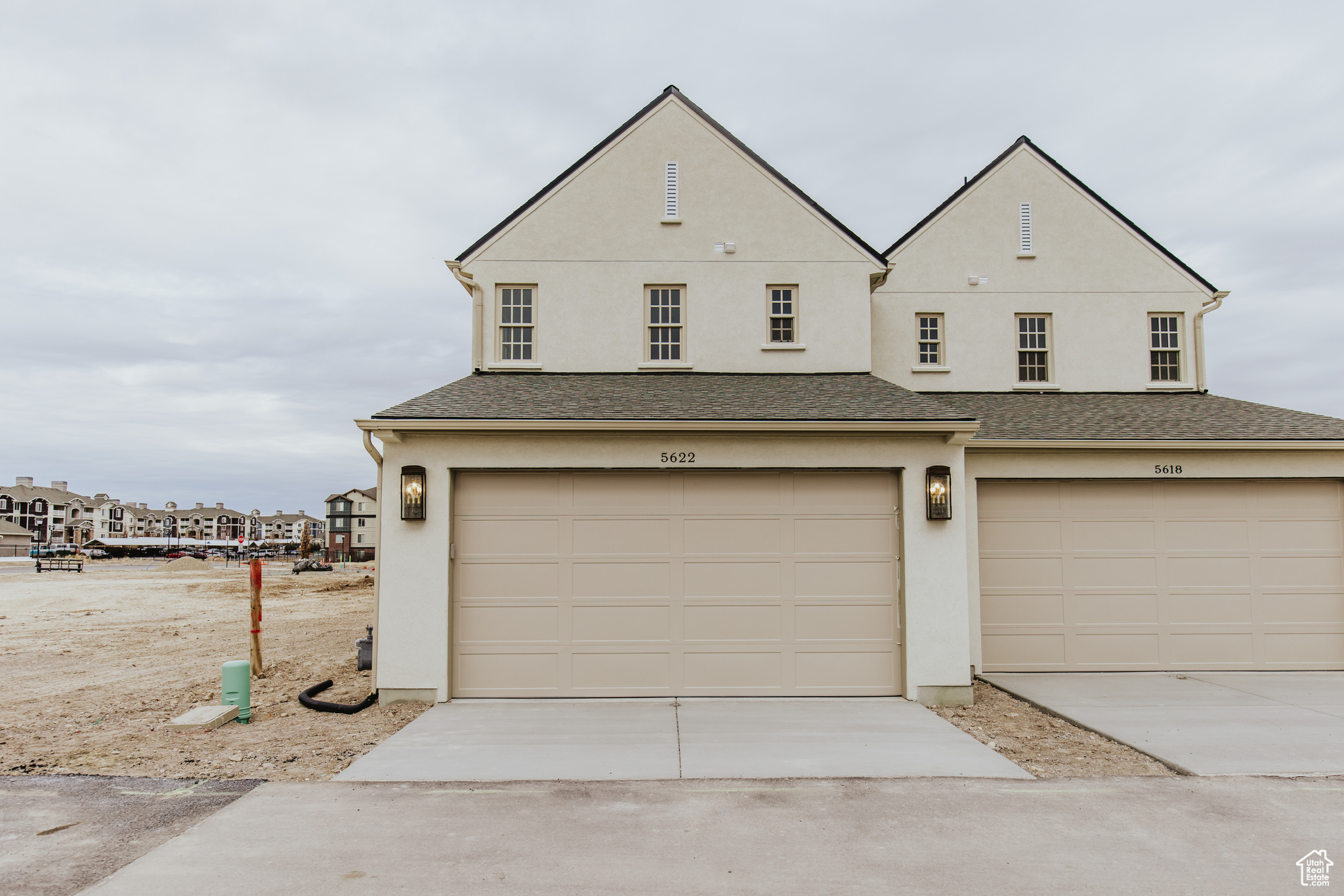 View of front of property with a garage