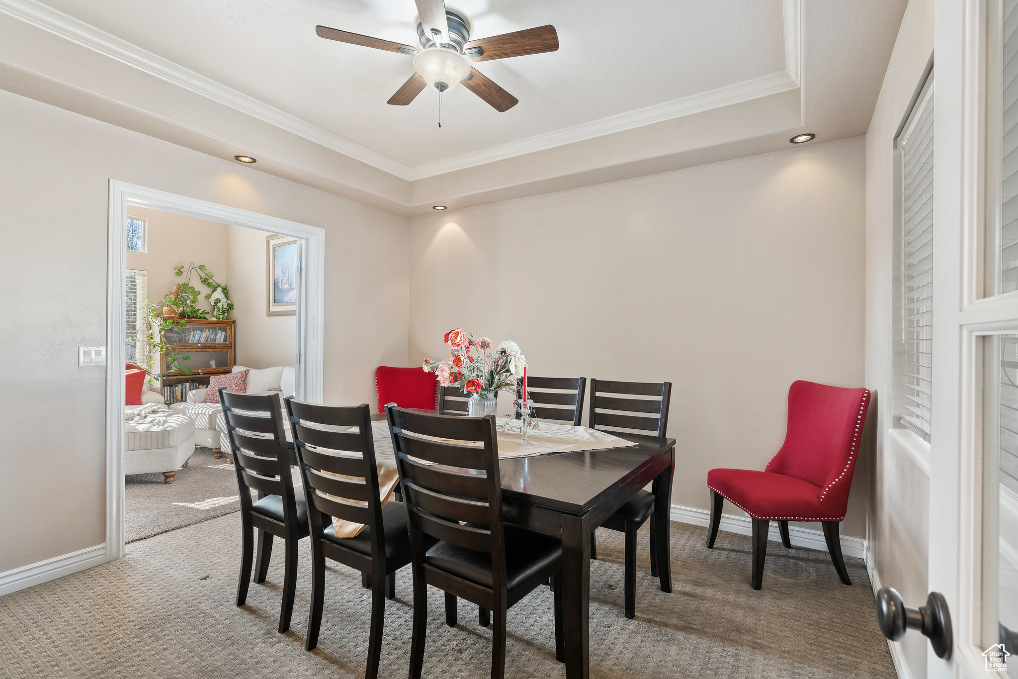 Formal dining room just off of the kitchen looking into the sitting room.