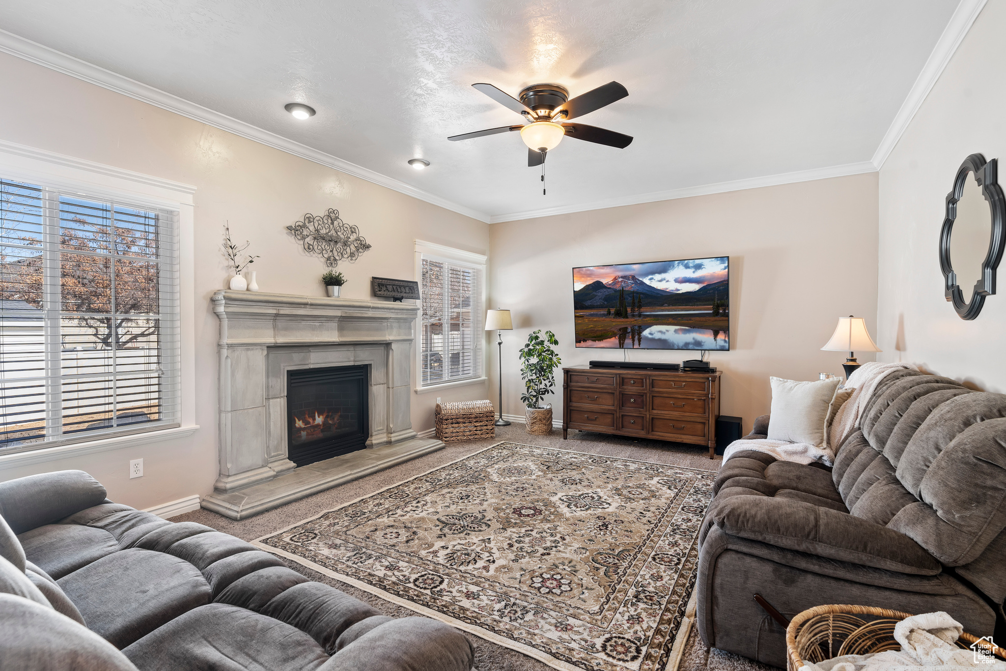 The great room. This is a large open space with a fireplace. GREAT ENTERTAINMENT SPACE as it is open to the kitchen and looks out to the backyard.