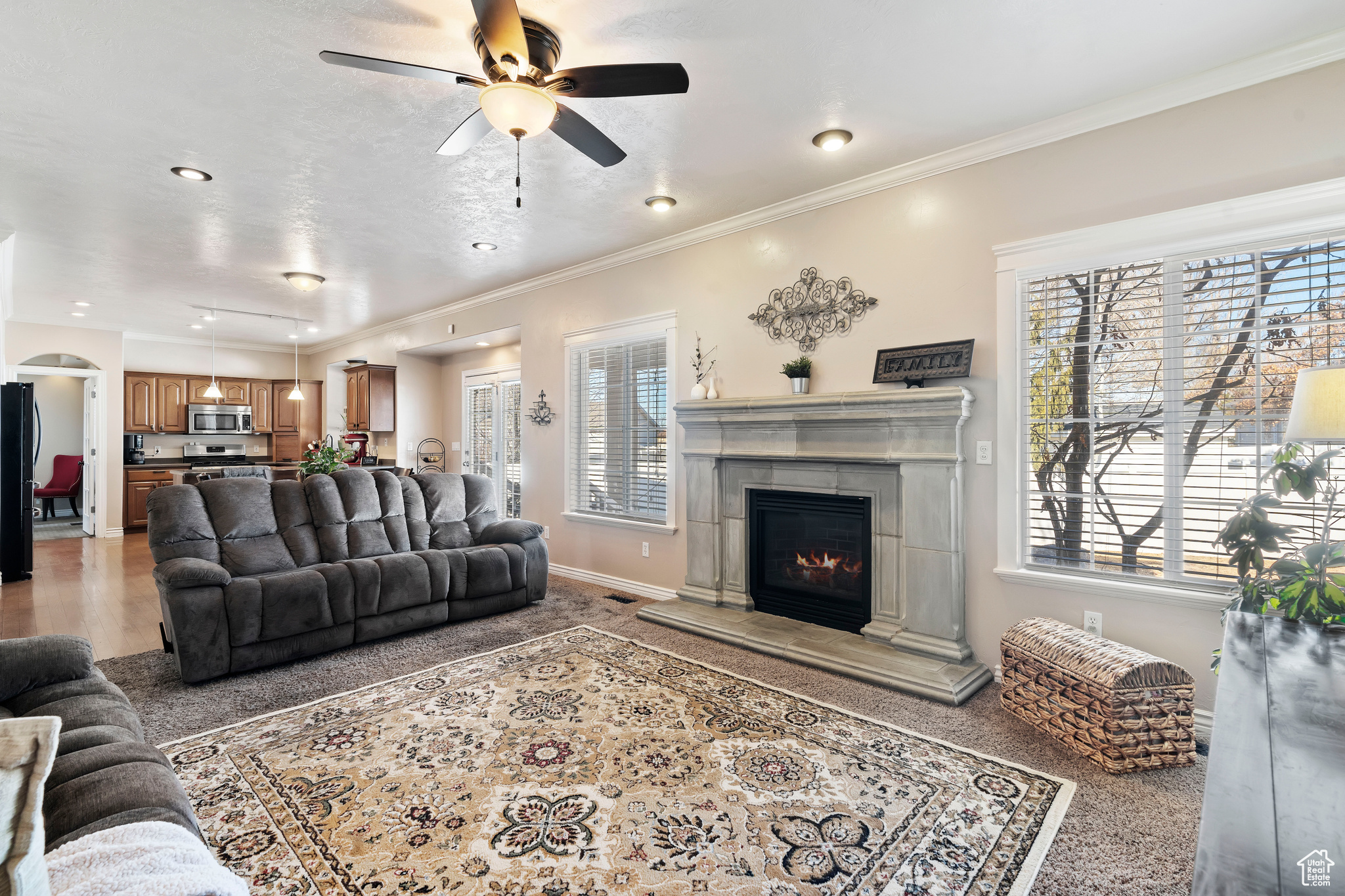 The great room. This is a large open space with a fireplace. GREAT ENTERTAINMENT SPACE as it is open to the kitchen and looks out to the backyard.