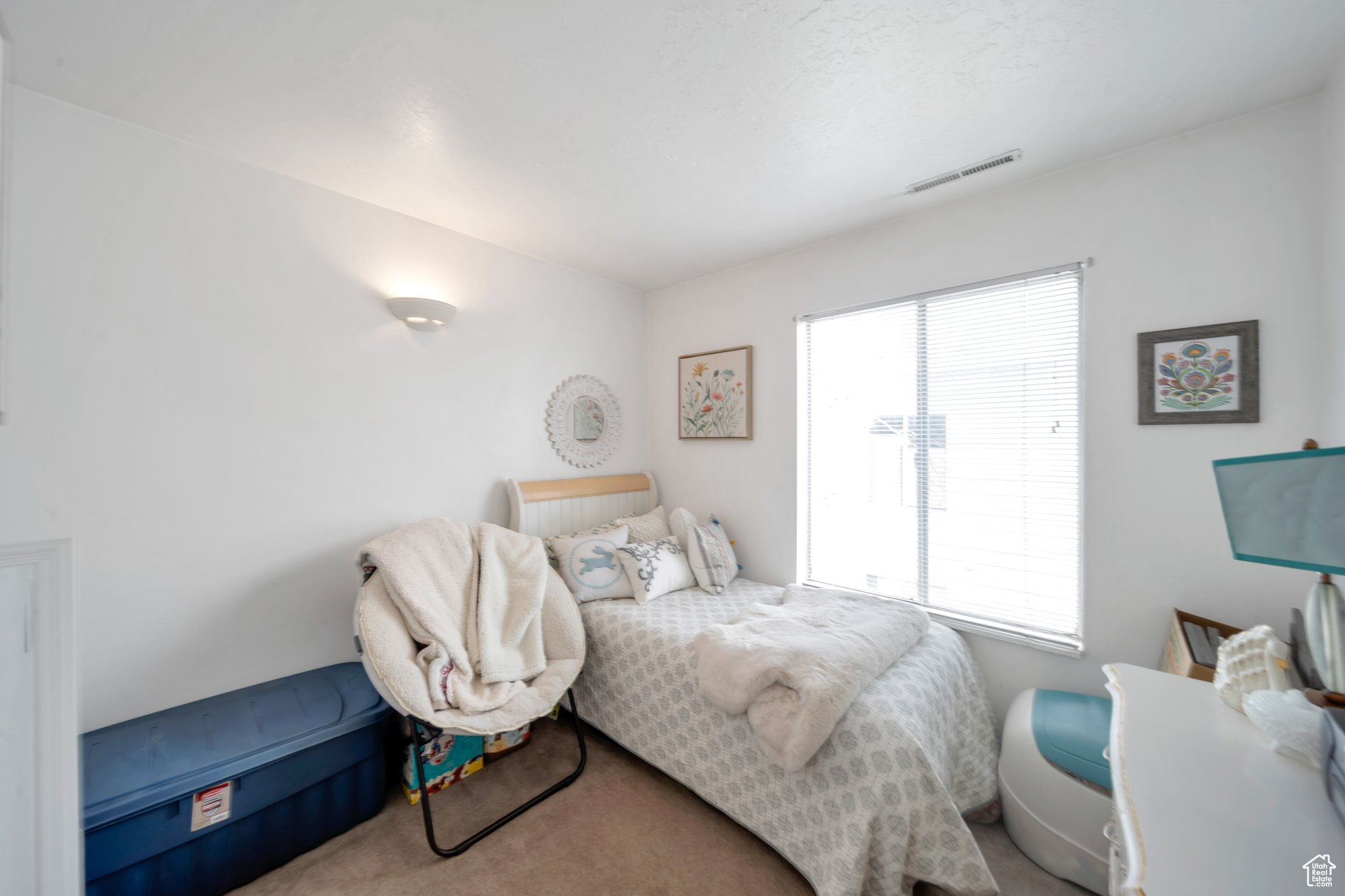 Bedroom featuring carpet floors