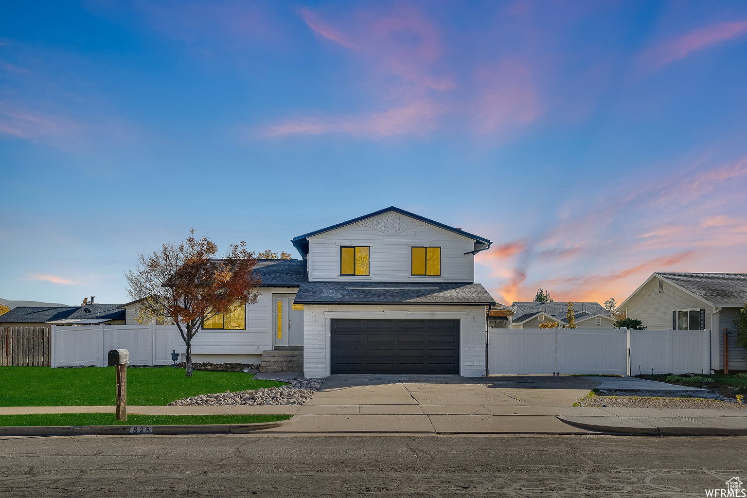 View of front facade with a garage