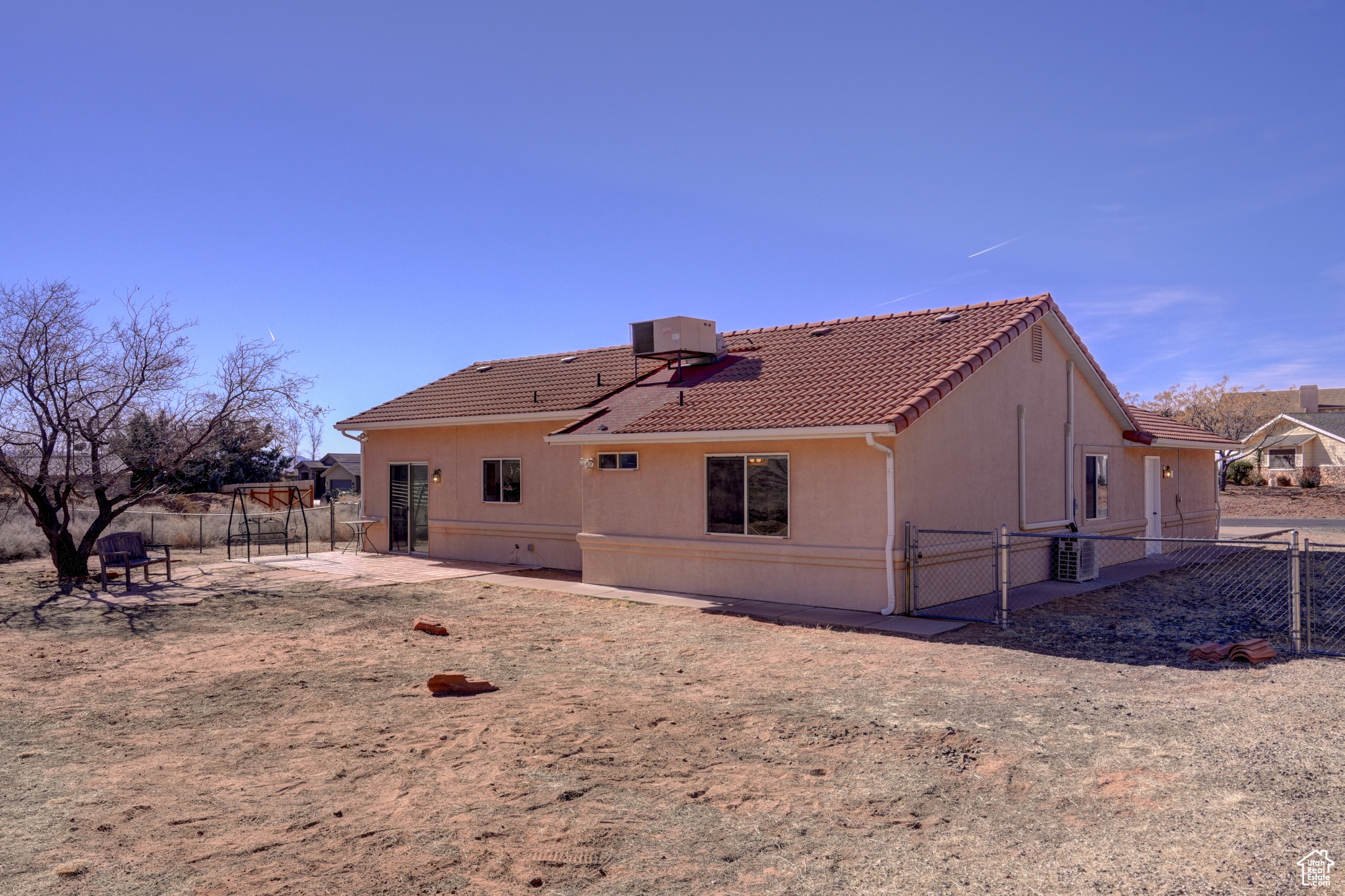 Back of property with cooling unit