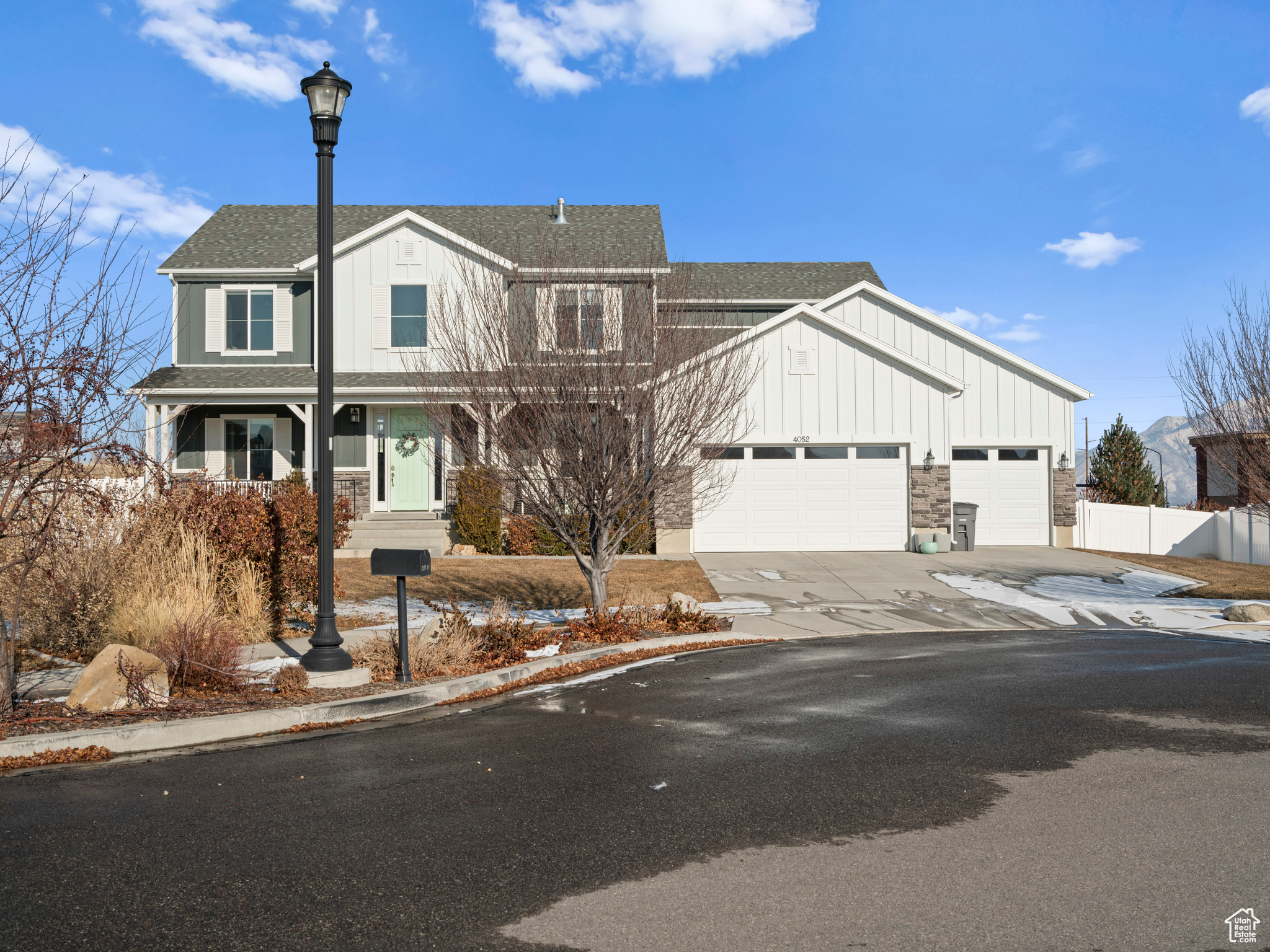 View of front of property featuring a garage