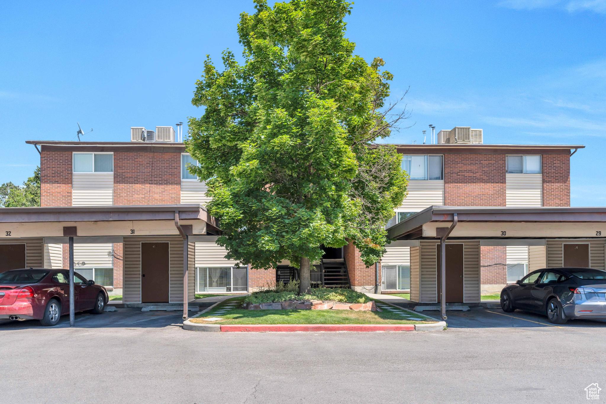 View of front of house featuring a carport