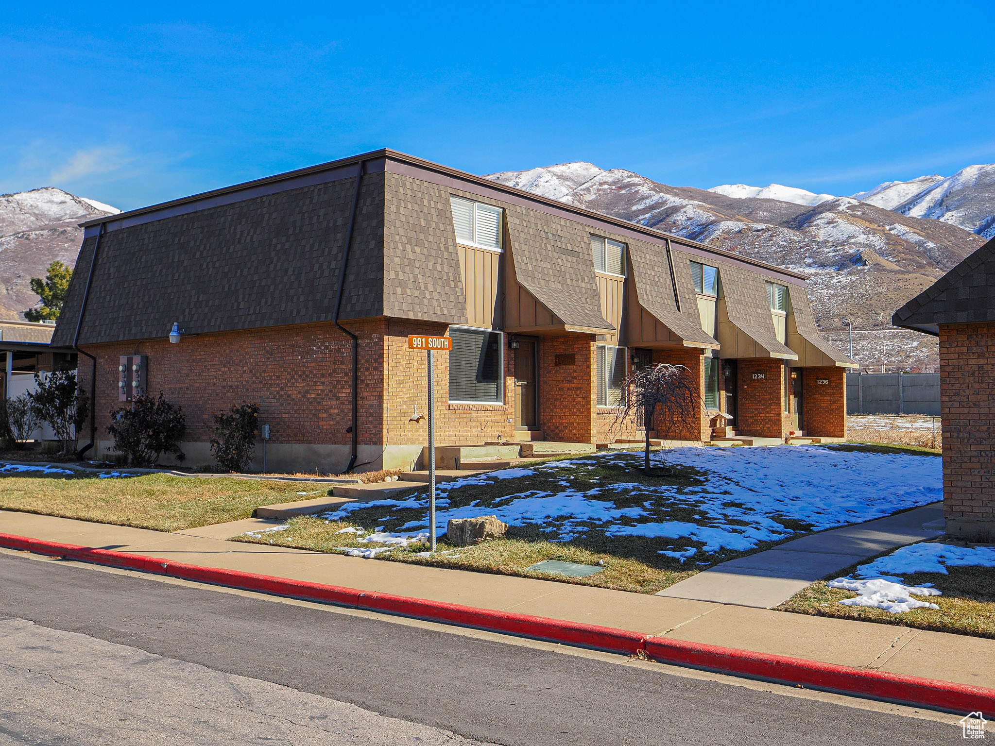 View of front of property featuring a mountain view