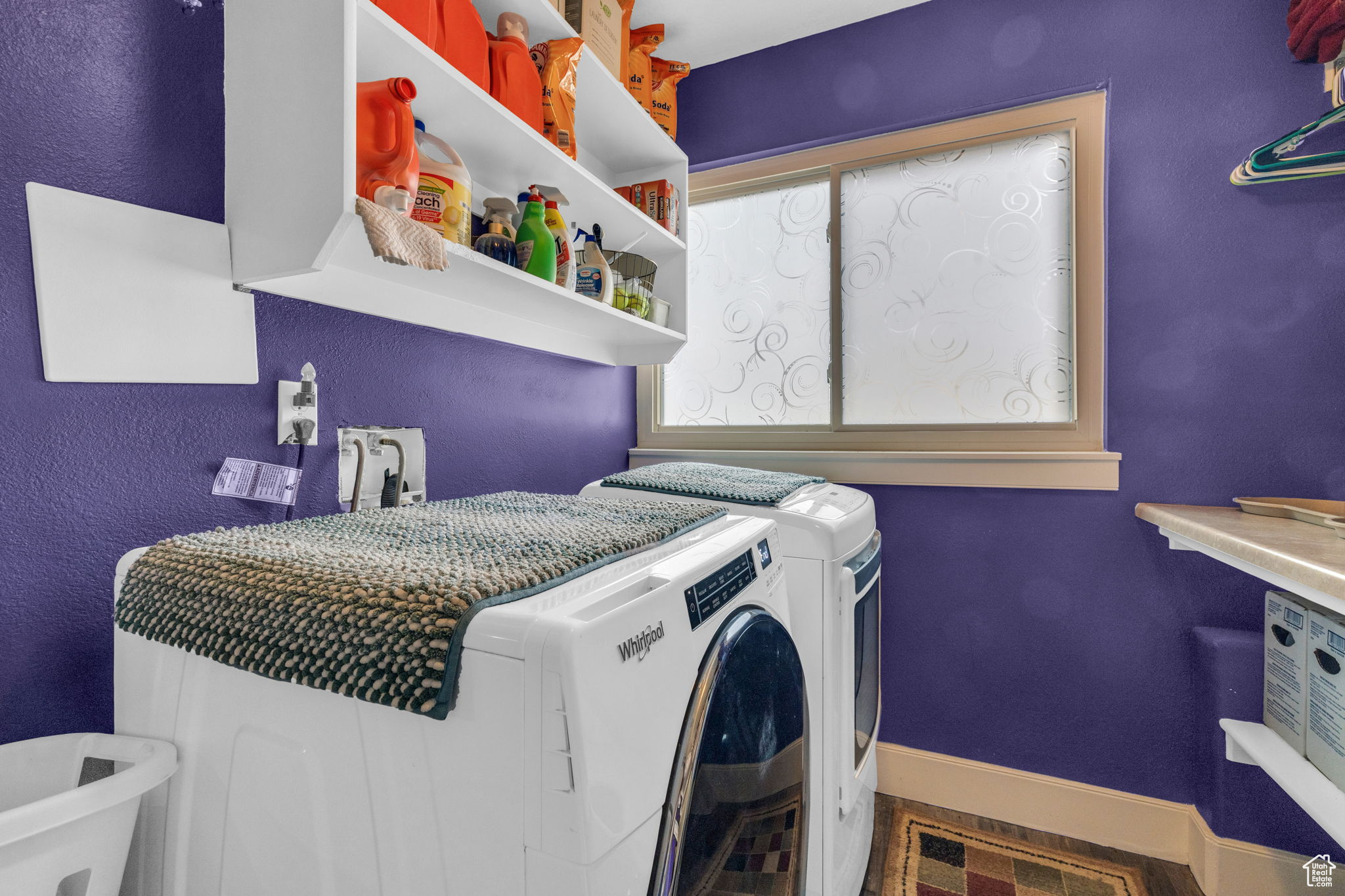 Laundry room with washing machine and dryer